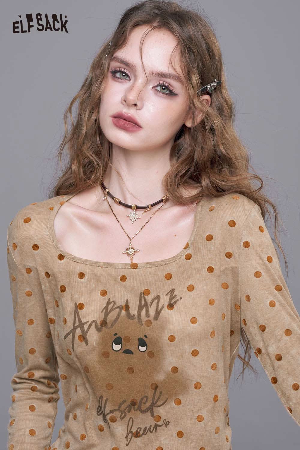 ELFSACK playful graphic print tee for women with brown polka dots and cute design