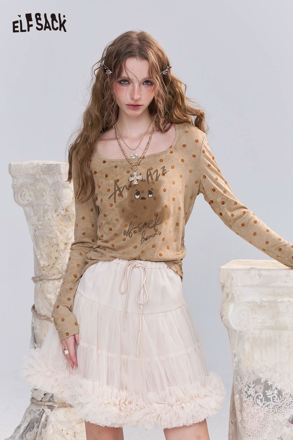 ELFSACK playful graphic print tee for women with polka dots and a stylish design, paired with a ruffled skirt