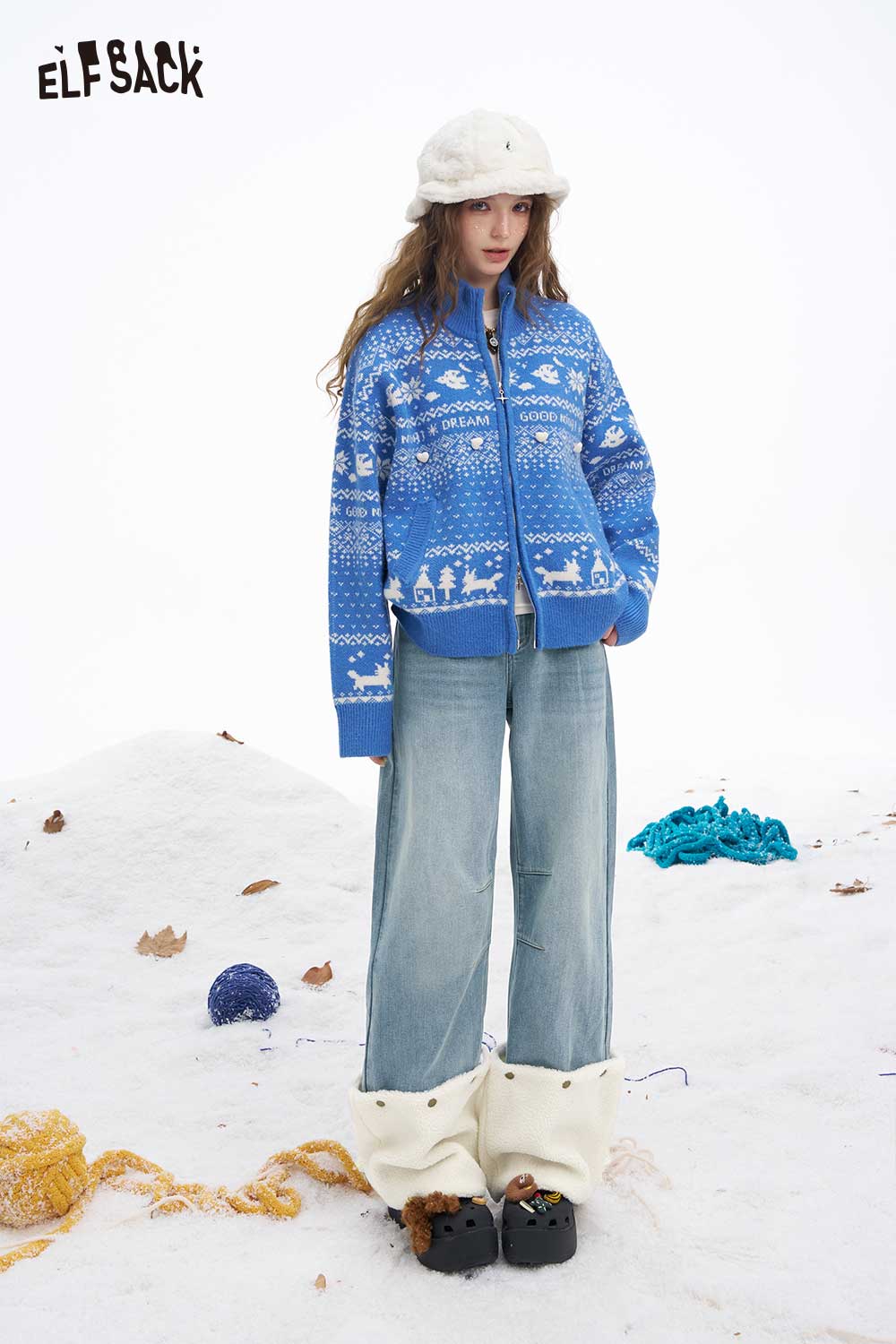 Model wearing ELFSACK plush hem patchwork jeans paired with a stylish winter sweater