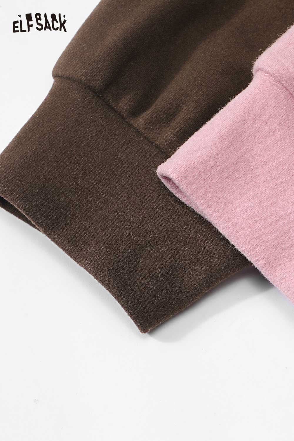 Close-up of ELFSACK plush teddy bear embroidery top showcasing soft fabric and color variations