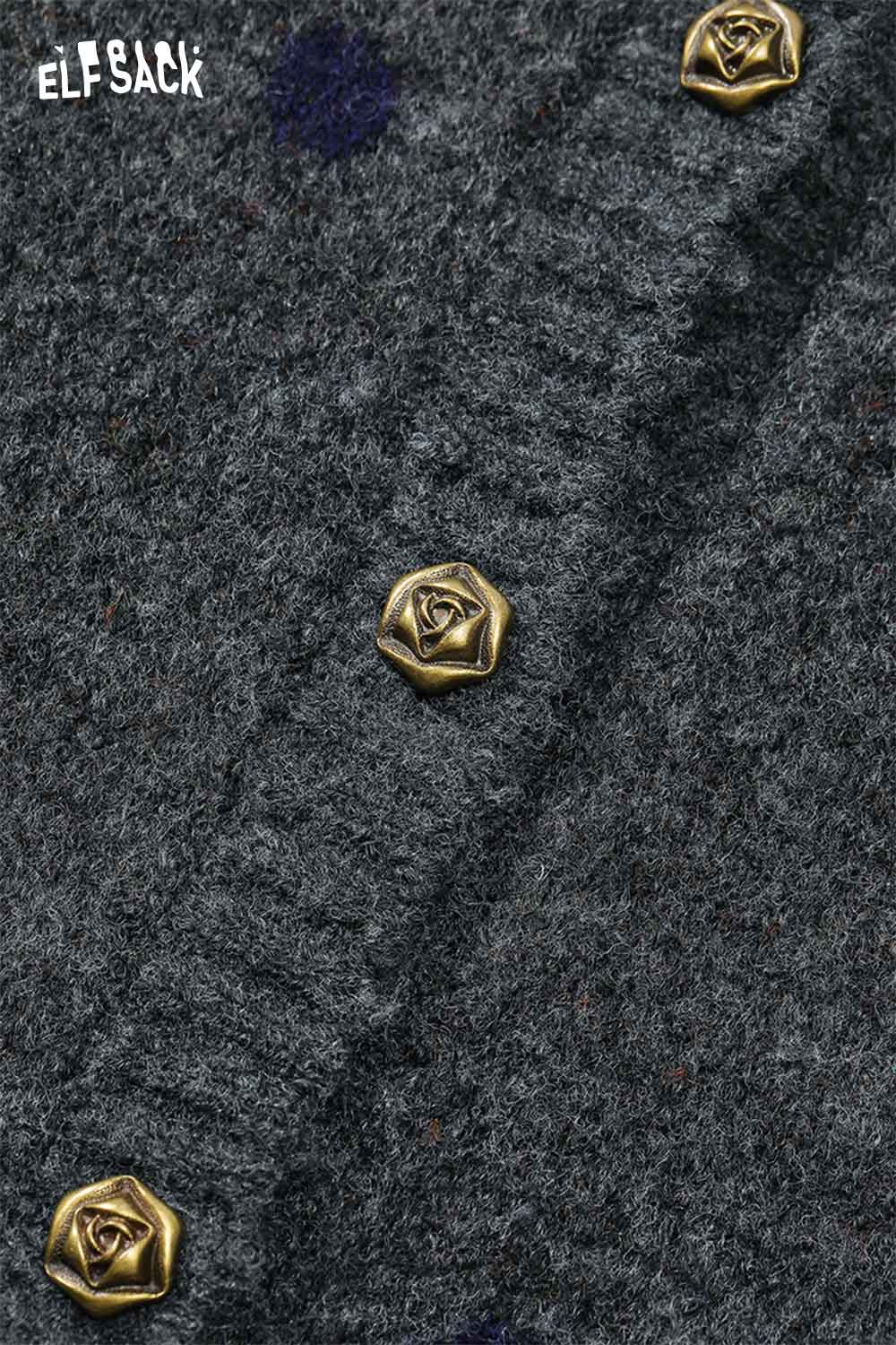 Close-up of ELFSACK buttons on a stylish polka dot skirt set for women in a dark fabric