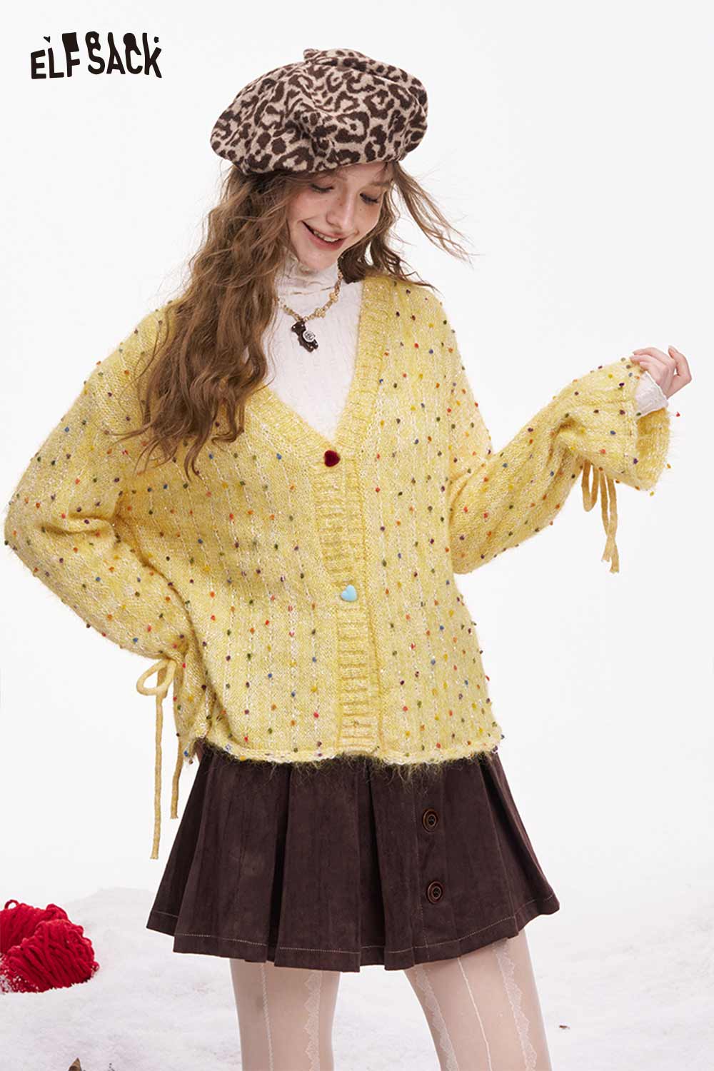ELFSACK yellow polka dot v neck cardigan with bell sleeves and playful design for casual outfits