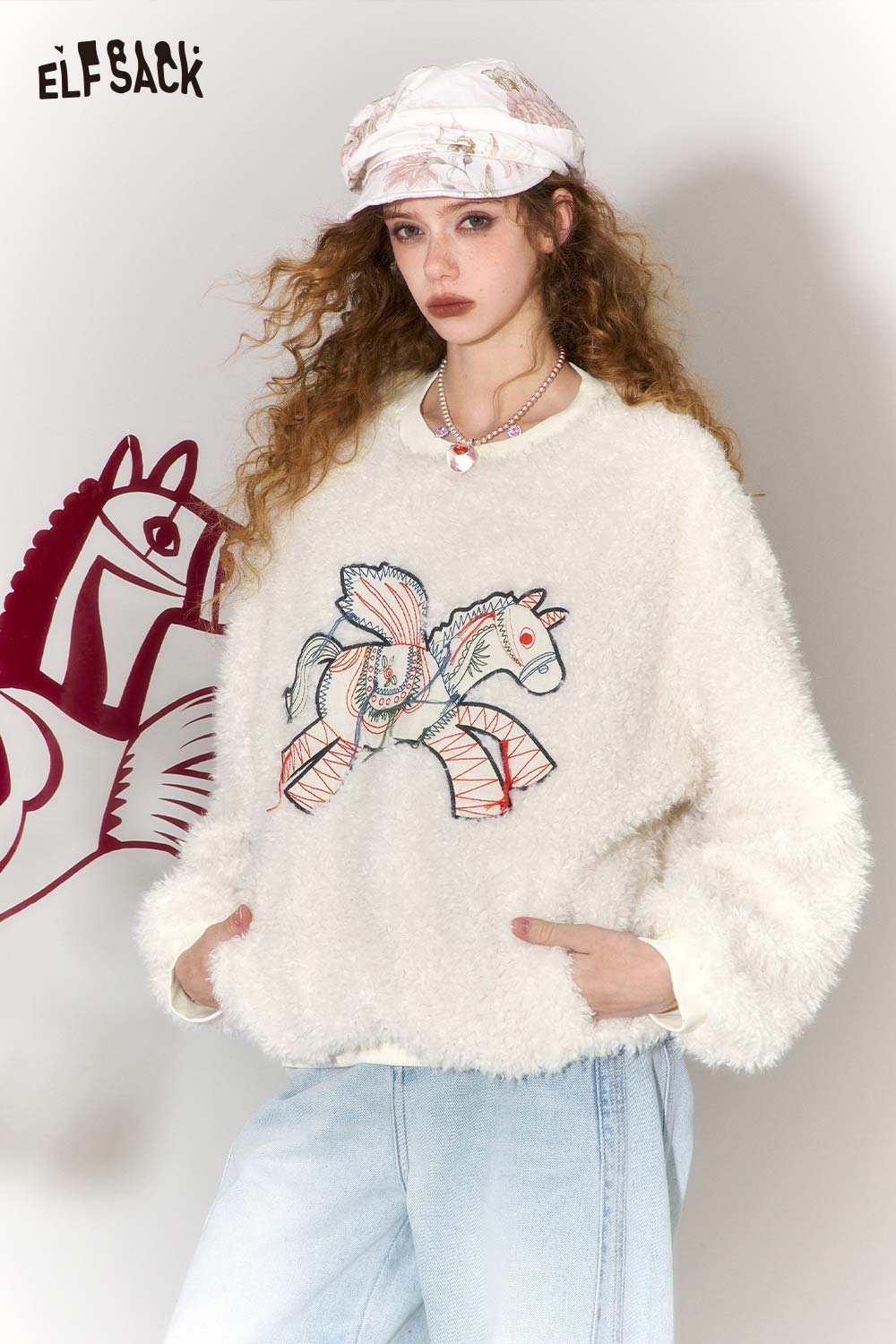 ELFSACK pony embroidered plush sweatshirt in cream with colorful pony design for cozy comfort