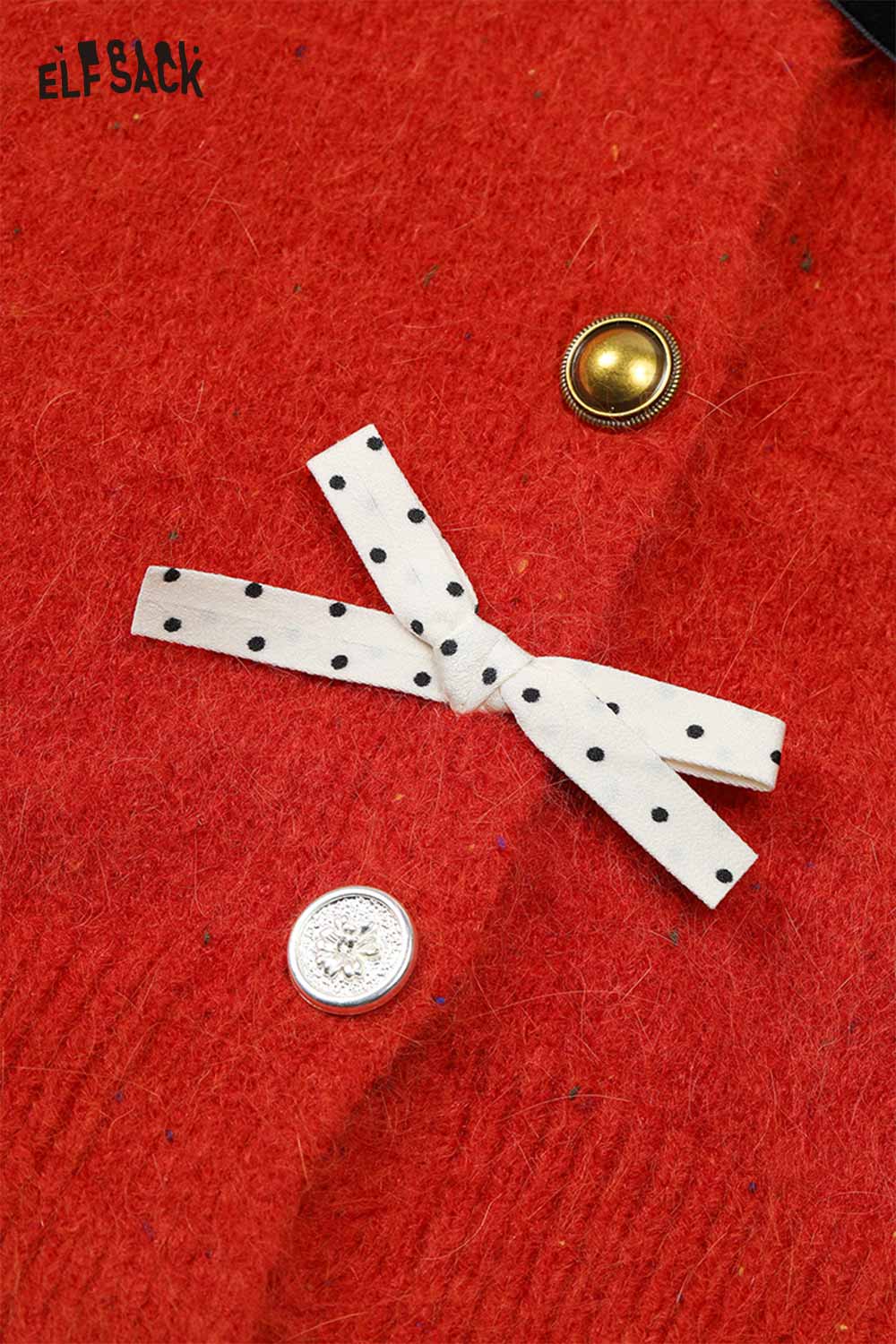 Close-up of ELFSACK preppy 3D bow cardigan in red featuring a polka dot ribbon detail