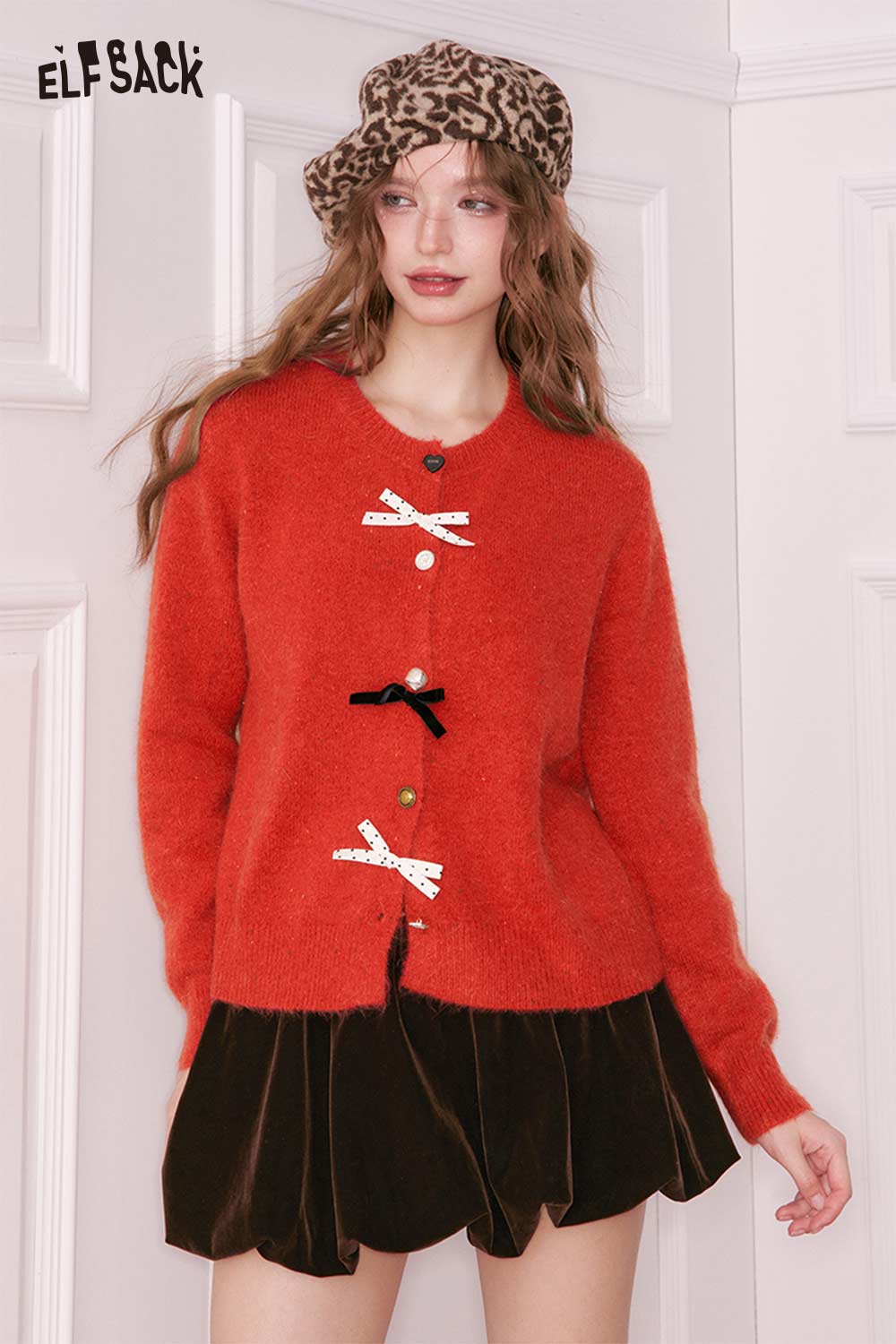 ELFSACK preppy 3D bow cardigan in orange with decorative bows and a cozy fit