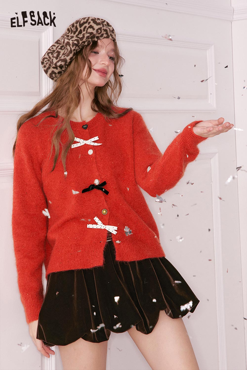 ELFSACK preppy 3D bow cardigan in bright orange with playful buttons and cozy design