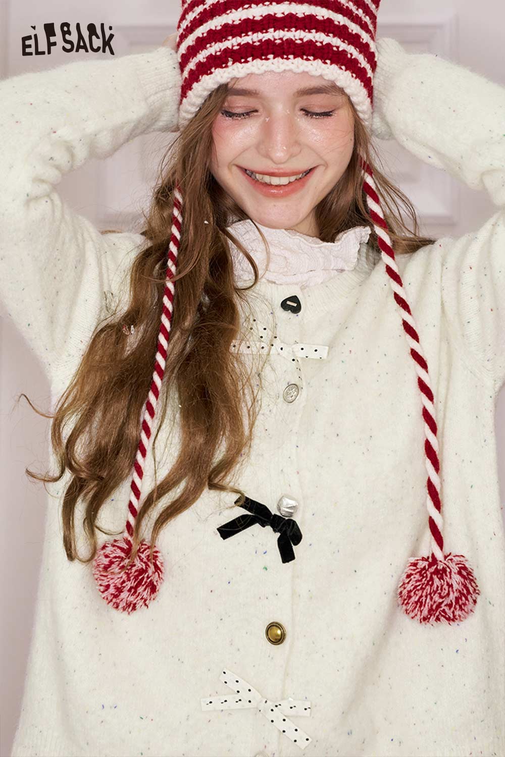 ELFSACK preppy 3D bow cardigan with playful buttons and a cozy knit design, perfect for stylish layering.