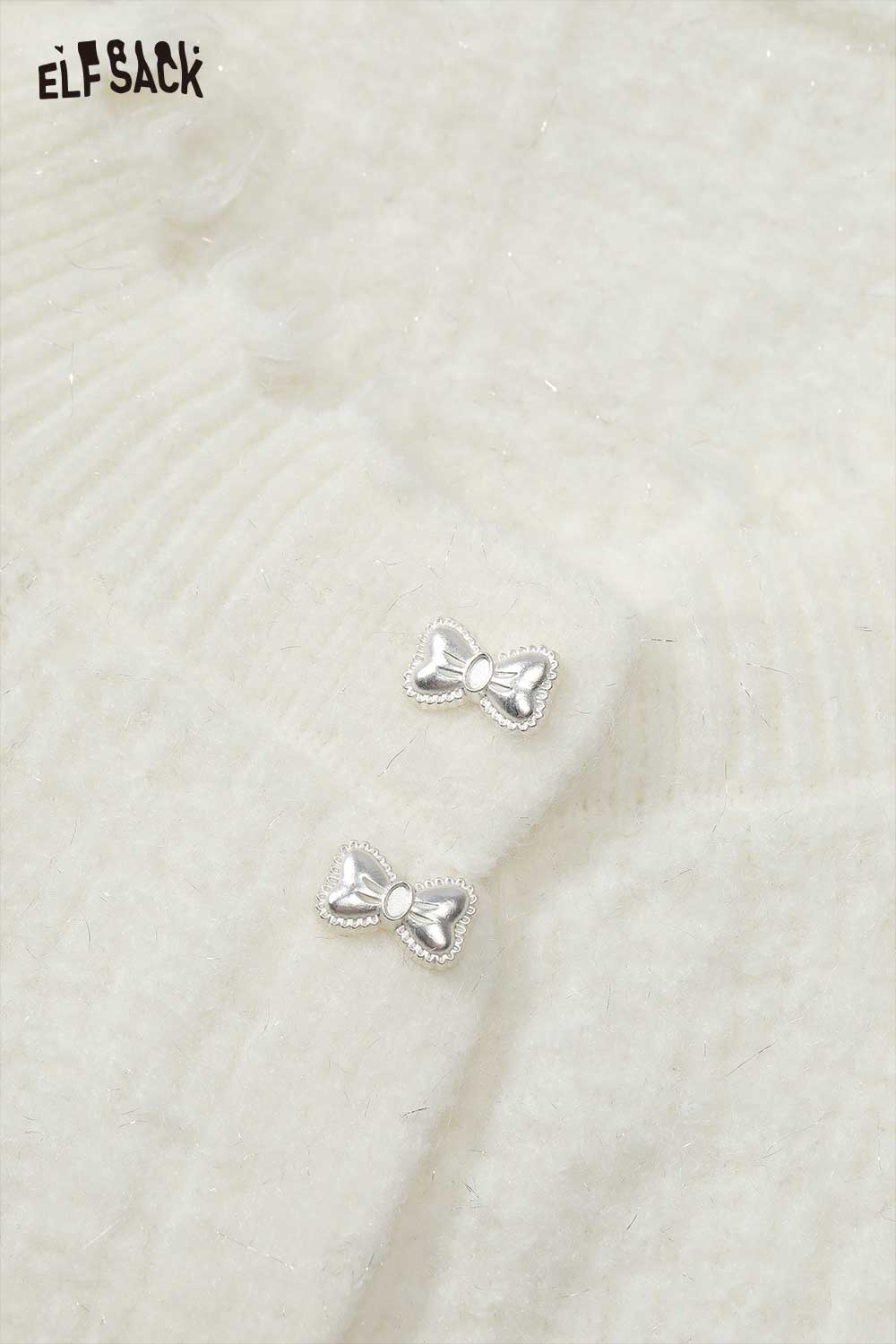 ELFSACK preppy fringe sweater for women featuring silver bow embellishments on a soft fabric