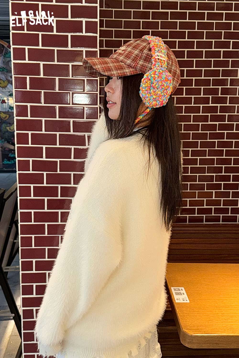 ELFSACK trendy preppy plaid baseball cap for women styled with a fluffy white sweater