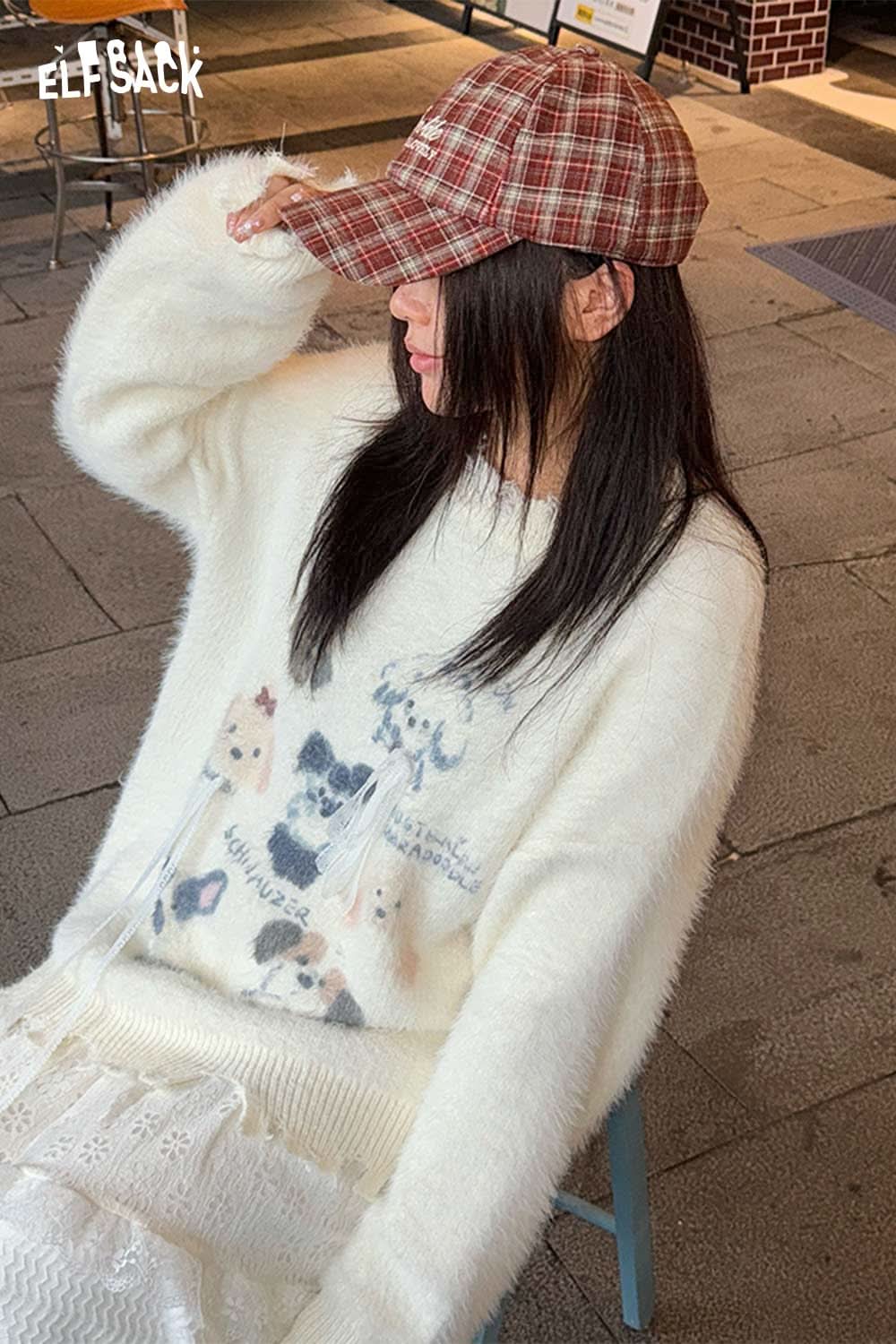 ELFSACK preppy plaid baseball cap for women styled with a cozy white sweater in a casual setting