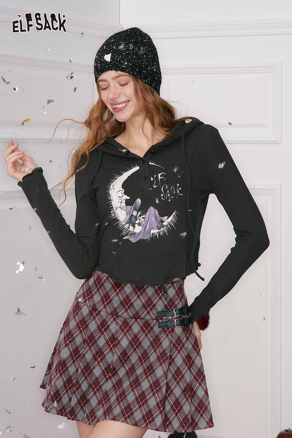 ELFSACK preppy plaid pleated short skirt paired with a stylish cropped hoodie for a trendy look