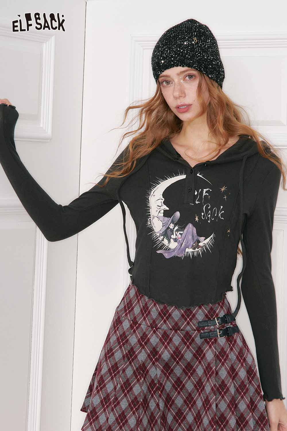 ELFSACK preppy plaid pleated short skirt paired with a trendy graphic hoodie and beanie