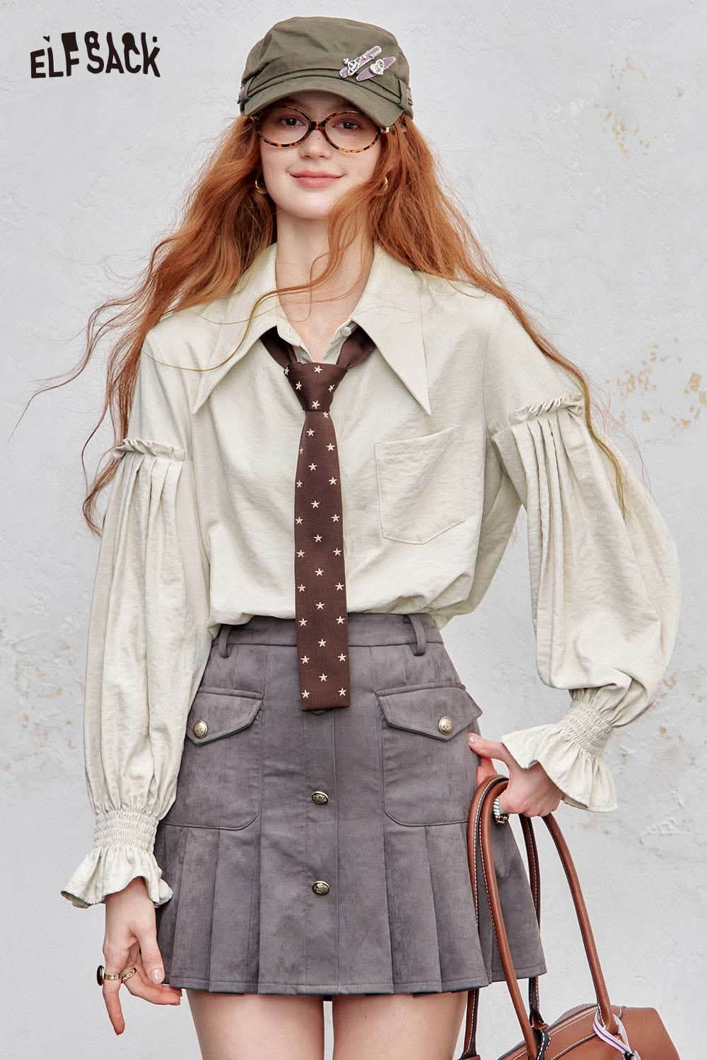 ELFSACK preppy ruffle sleeve shirt for women styled with a brown tie and gray skirt