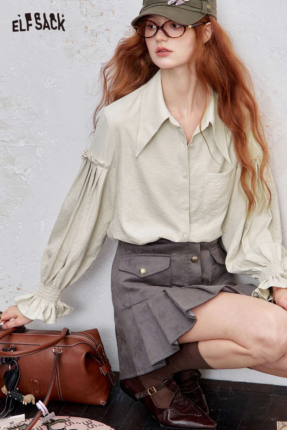 ELFSACK preppy ruffle sleeve shirt for women in light fabric paired with a stylish skirt and accessories