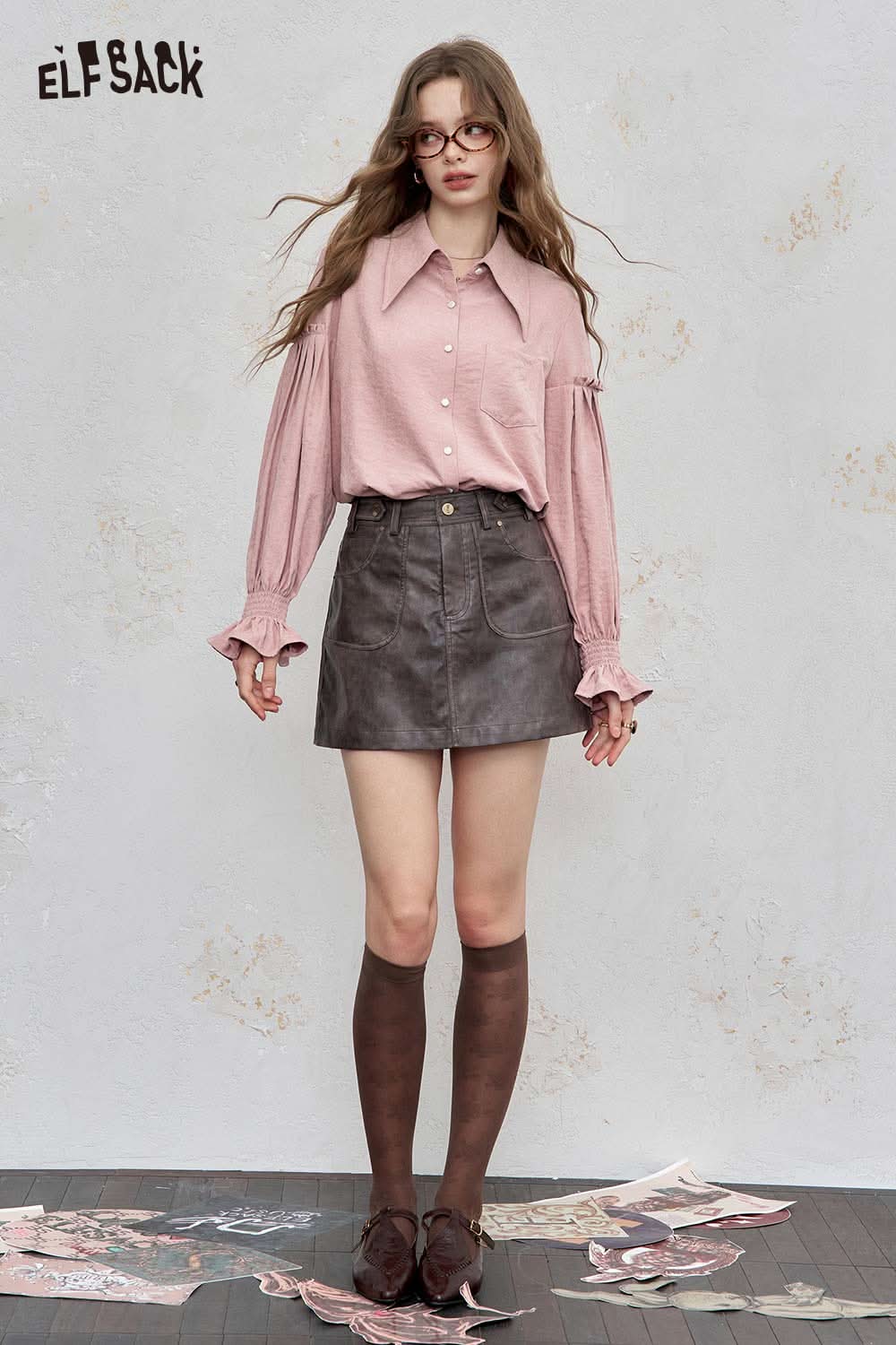 ELFSACK preppy ruffle sleeve shirt for women in pink paired with a black faux leather skirt