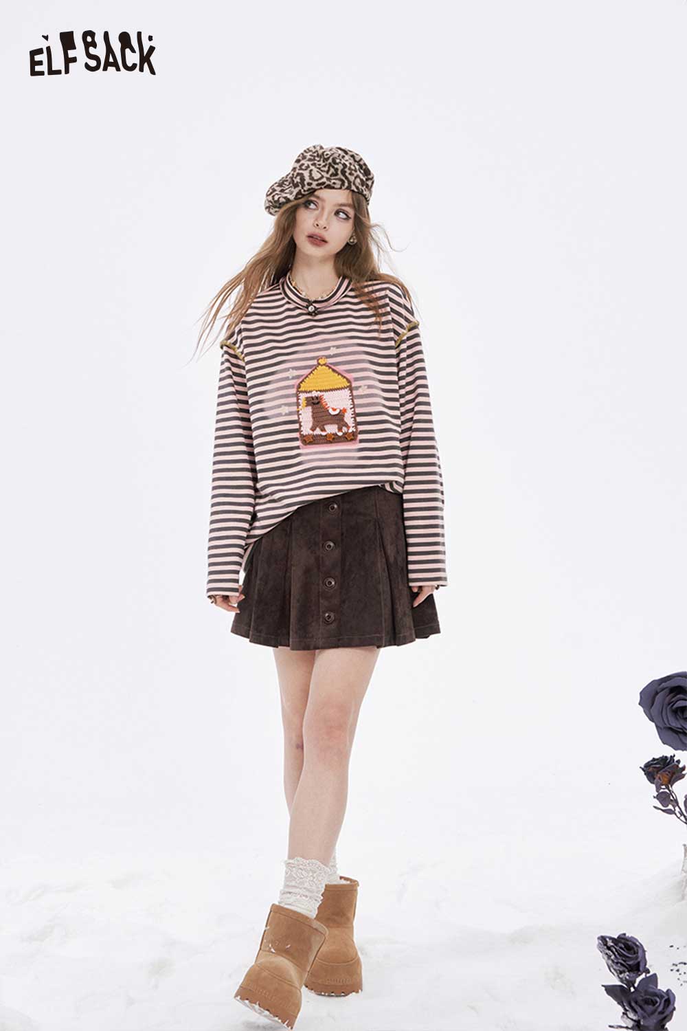 ELFSACK preppy striped graphic t-shirt for women styled with a chic skirt and accessories