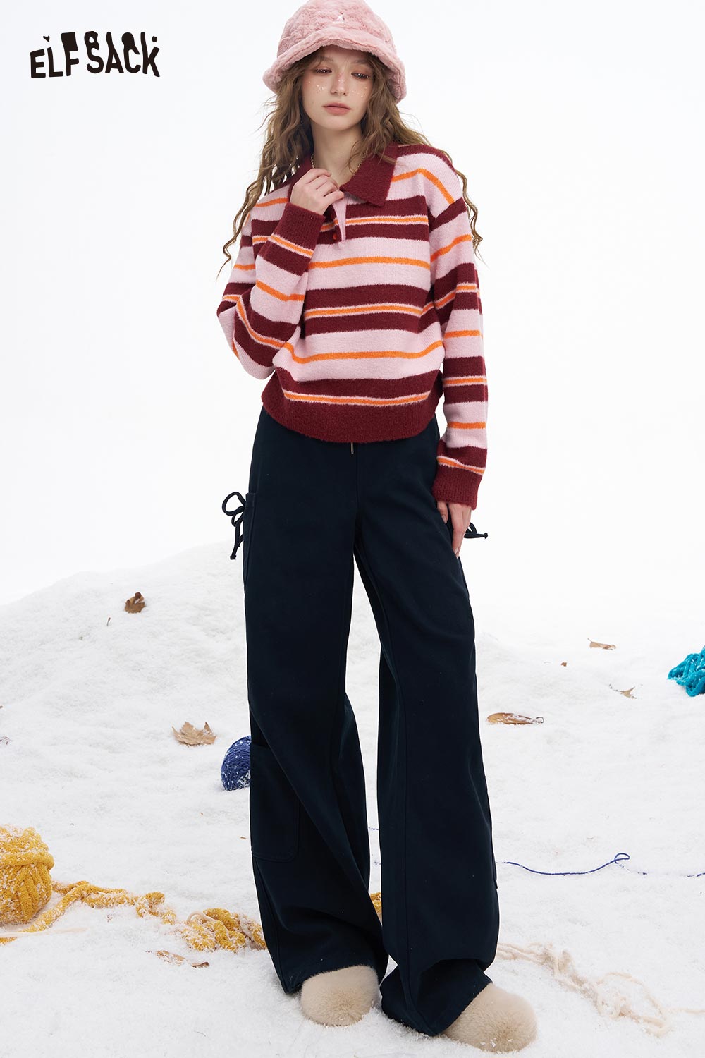 ELFSACK preppy striped polo sweater in soft pastel colors, styled with wide-leg pants