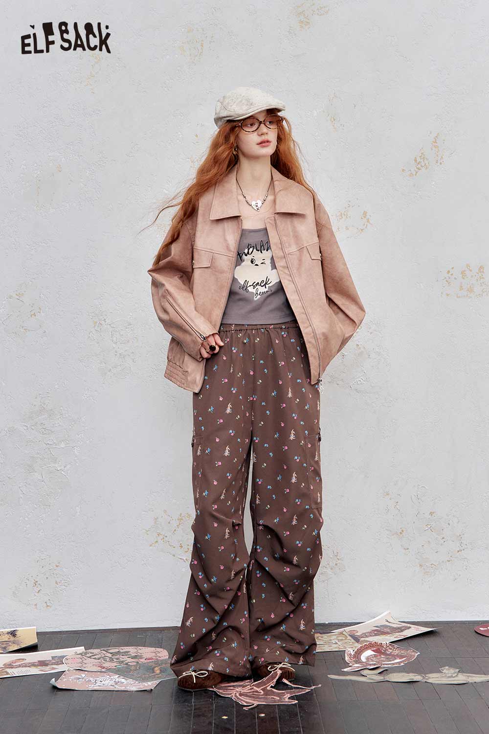 Fashionable ELFSACK PU leather motocross jacket for women styled with trendy pants and accessories