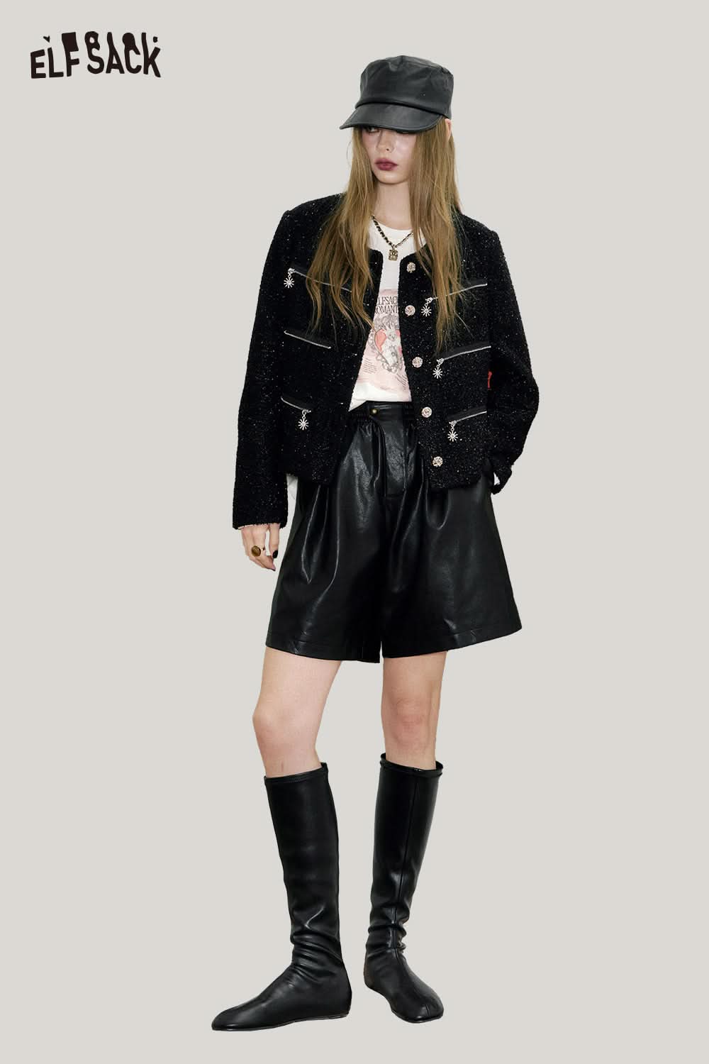 ELFSACK PU leather pleated shorts styled with a black jacket and knee-high boots