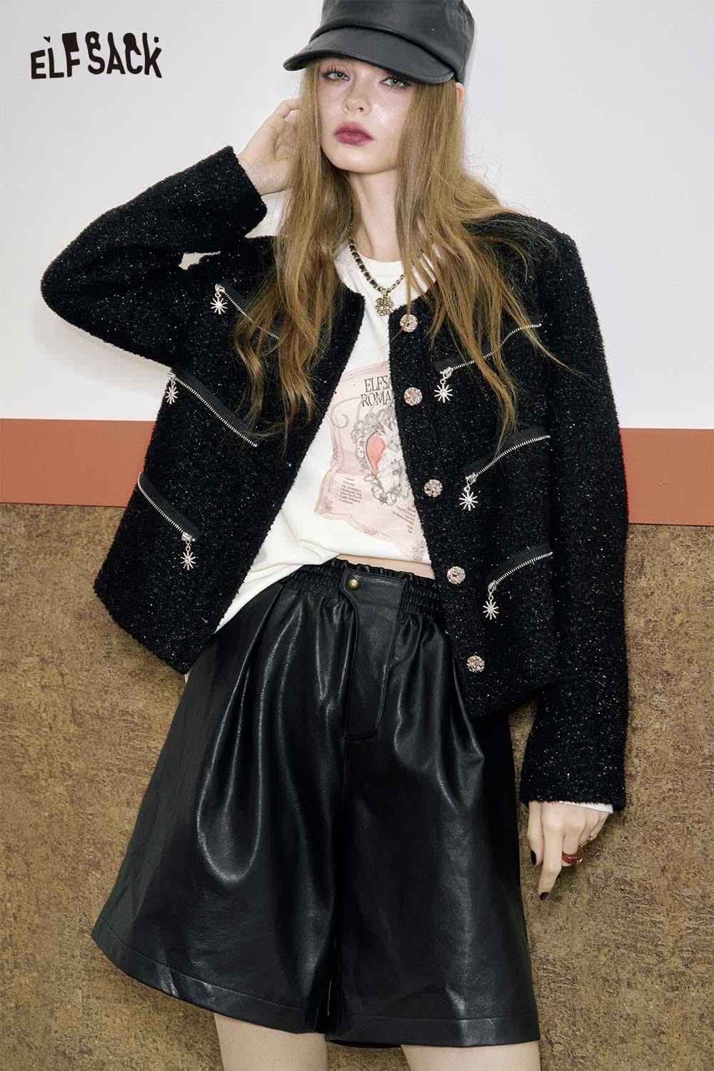 ELFSACK stylish model wearing PU leather pleated shorts paired with a chic jacket and cap
