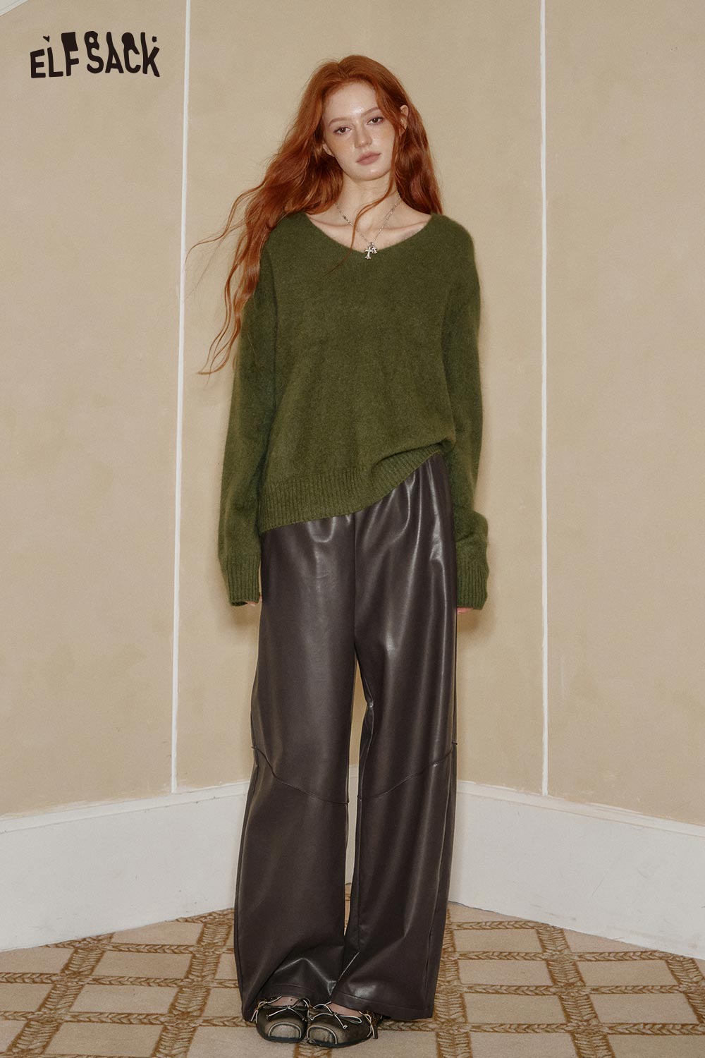 ELFSACK PU leather relaxed fit trousers paired with a cozy green sweater for a stylish look