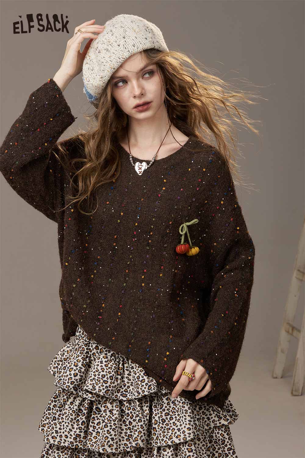 ELFSACK pumpkin motif knit sweater in brown with colorful accents and a relaxed fit