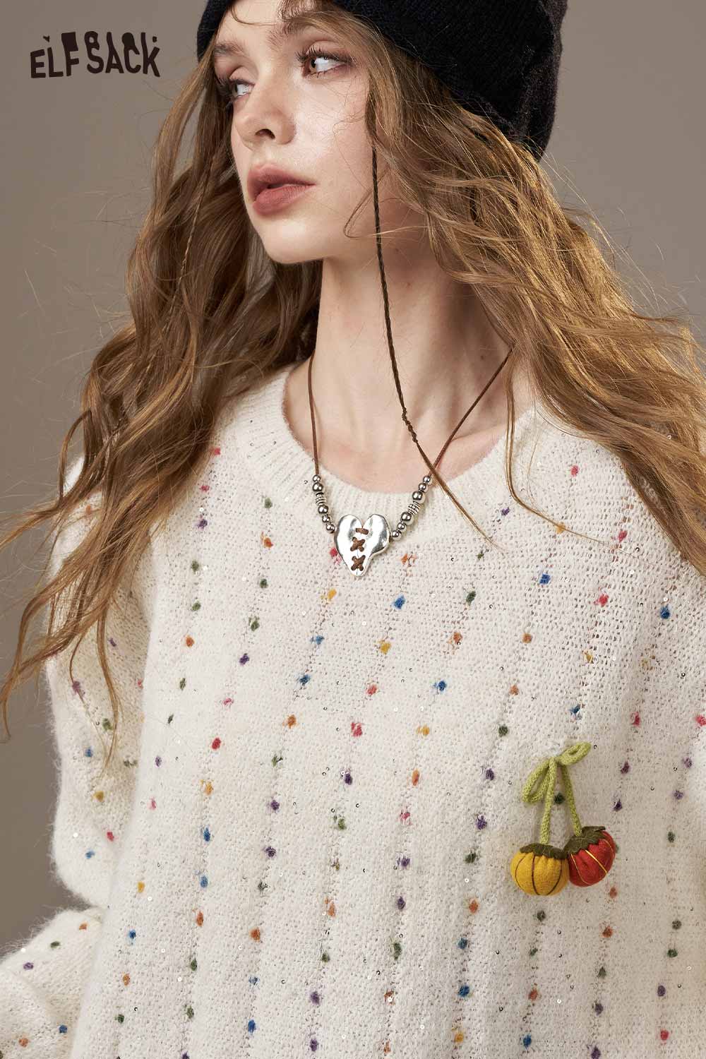 ELFSACK pumpkin motif knit sweater with colorful dots and playful pumpkin detail on a cozy design
