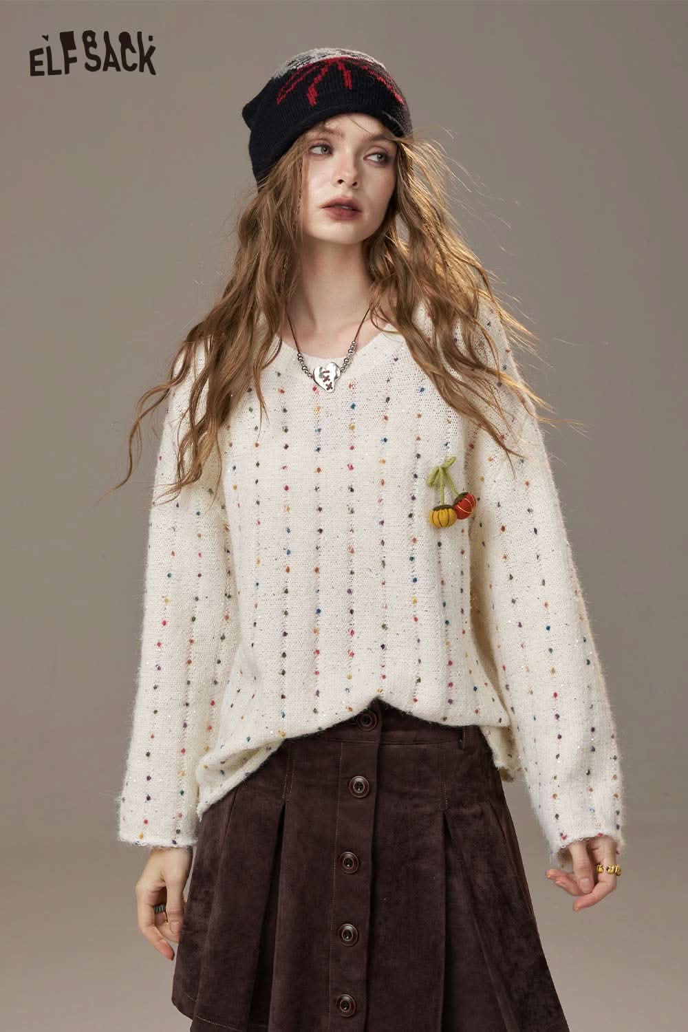 ELFSACK pumpkin motif knit sweater in cream with colorful dots and a relaxed fit for a cozy look