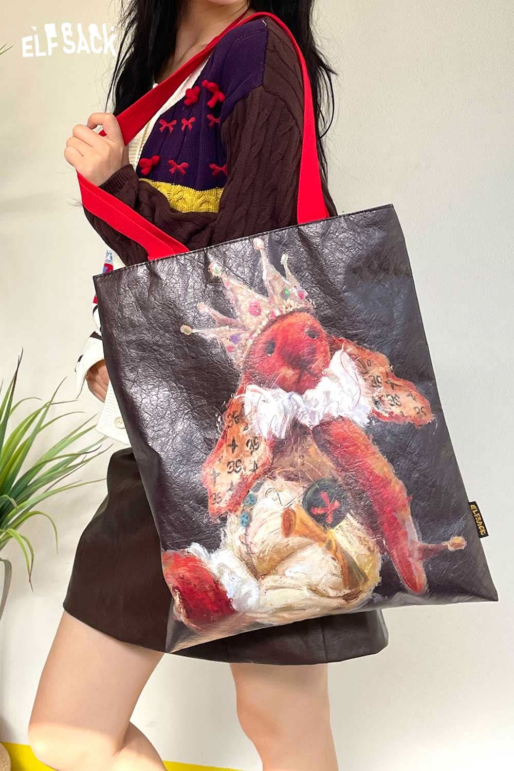 ELFSACK rabbit art tote bag featuring a colorful rabbit design with red straps for stylish carrying