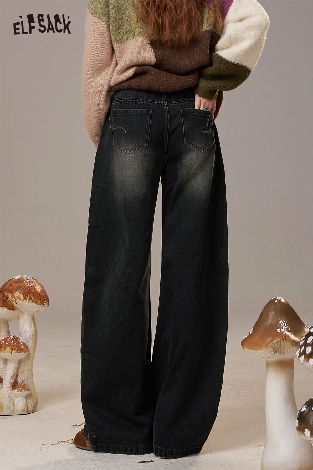 Back view of ELFSACK rainbow embroidery wide leg jeans in dark denim with a stylish fit