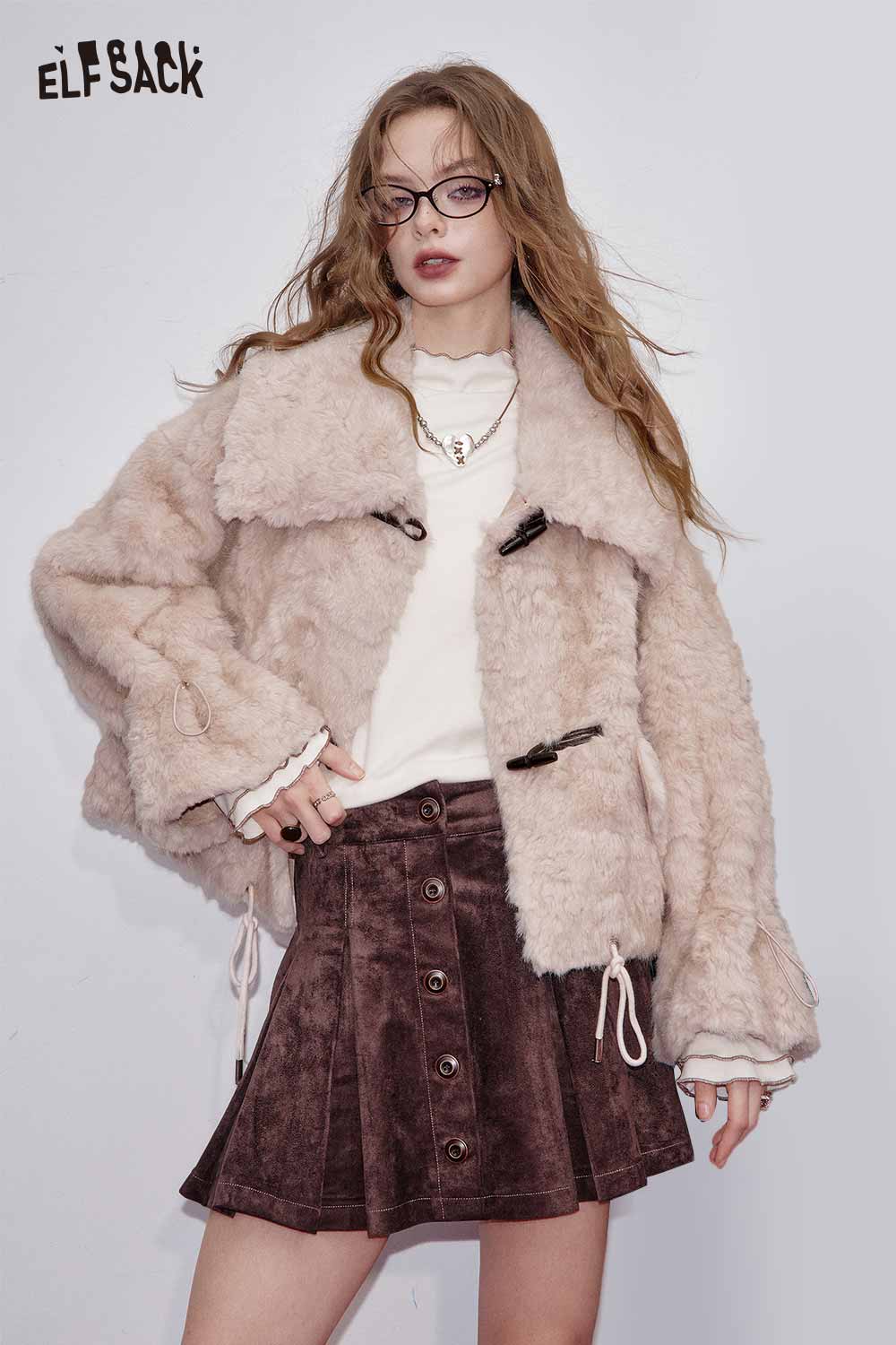 ELFSACK recycled faux fur coat for women in light pink, styled with a white sweater and brown skirt