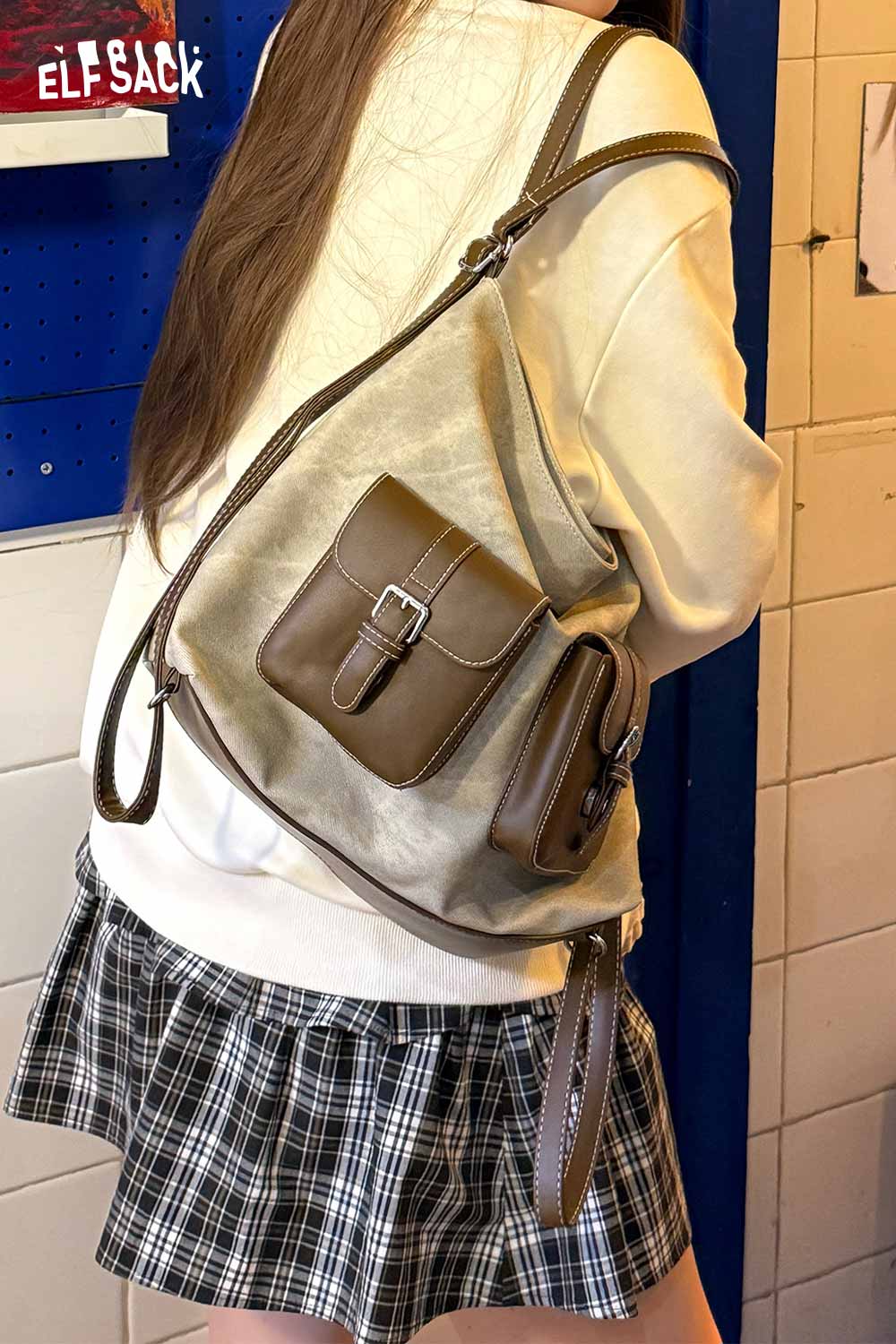 ELFSACK recycled faux leather crossbody bag with adjustable strap and stylish design for casual outings