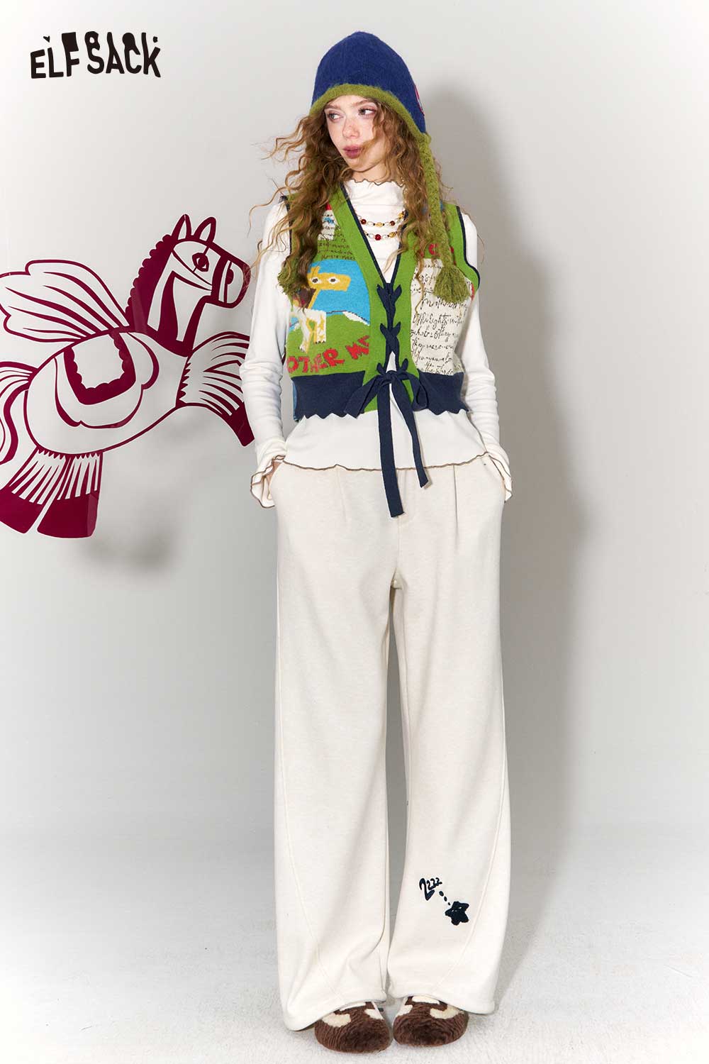 ELFSACK retro denim knit vest for women featuring colorful patterns and a stylish layered look