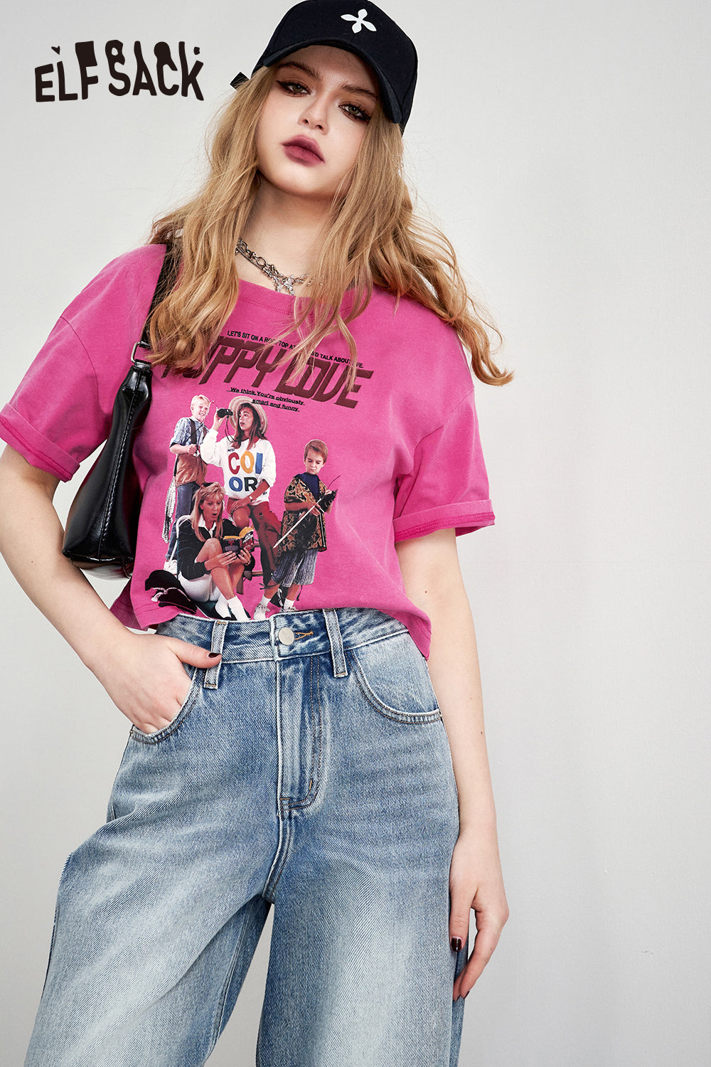 ELFSACK pink Retro Graphic T-shirt with colorful vintage style print worn with blue jeans