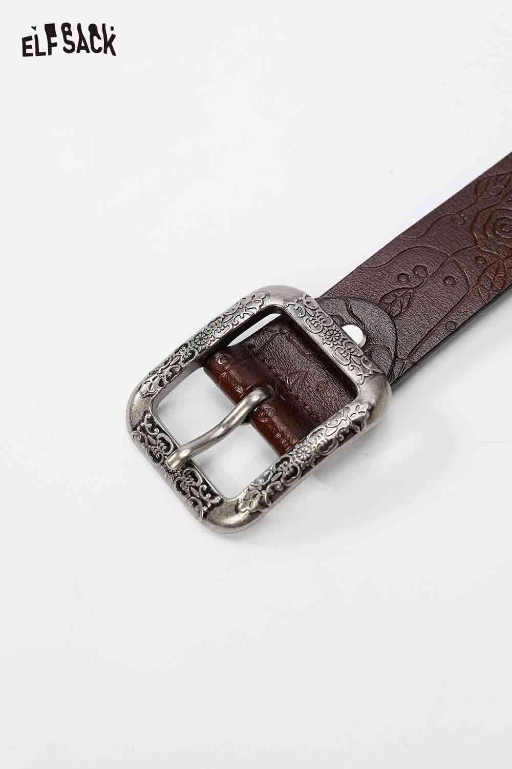 ELFSACK reversible rose pattern belt with an ornate silver buckle and textured leather design