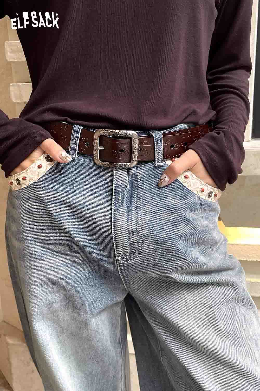 ELFSACK reversible rose pattern belt styled with high-waisted jeans and a casual top for a trendy look