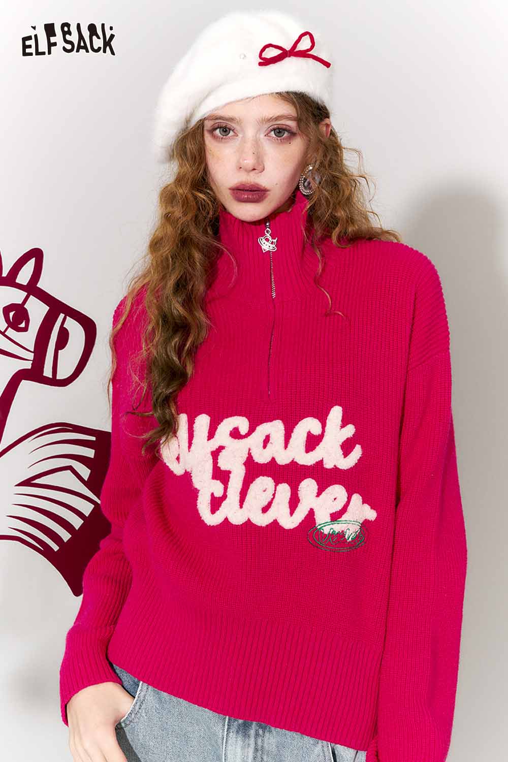 ELFSACK rose pink embroidered sweater with a stylish half-zip design and playful lettering
