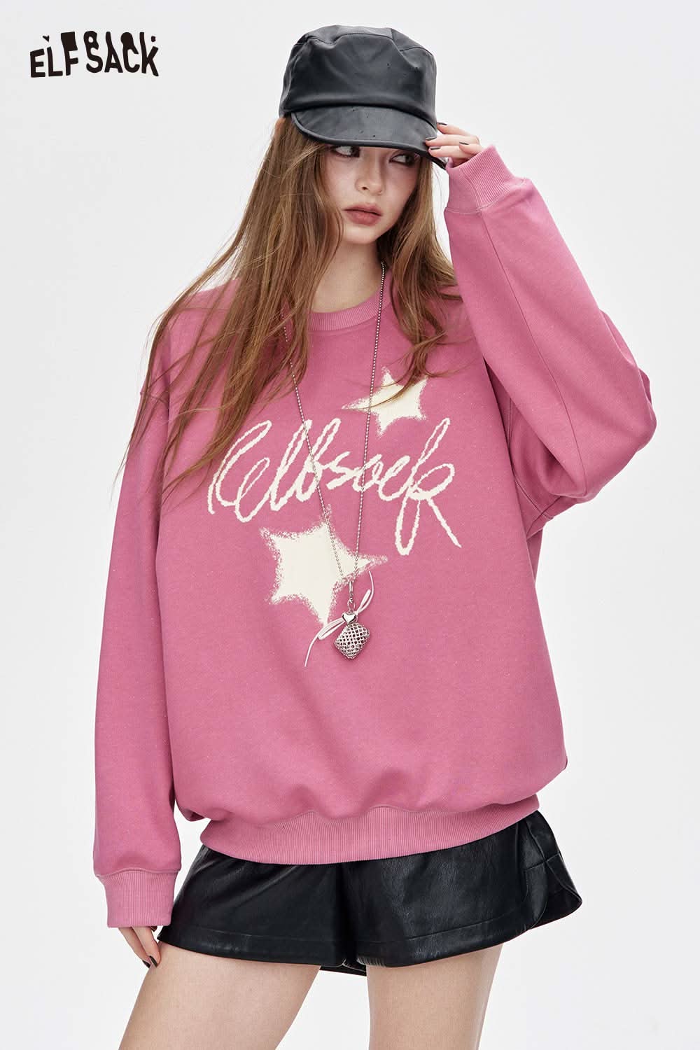 Pink oversized graphic star sweatshirt by ELFSACK with stylish star design and relaxed fit