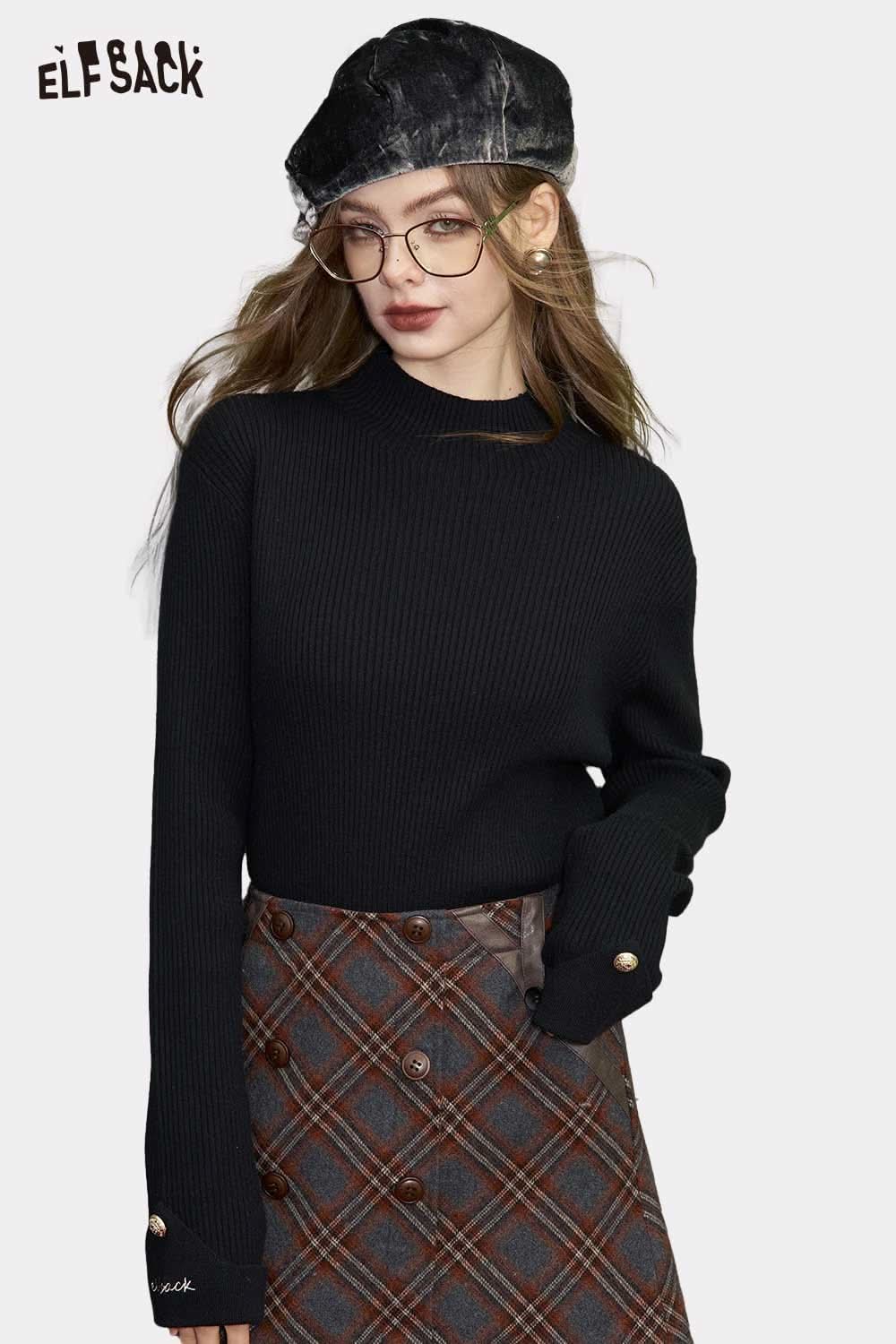 ELFSACK soft Halloween slim fit top in black with ribbed texture, paired with plaid skirt and stylish accessories.