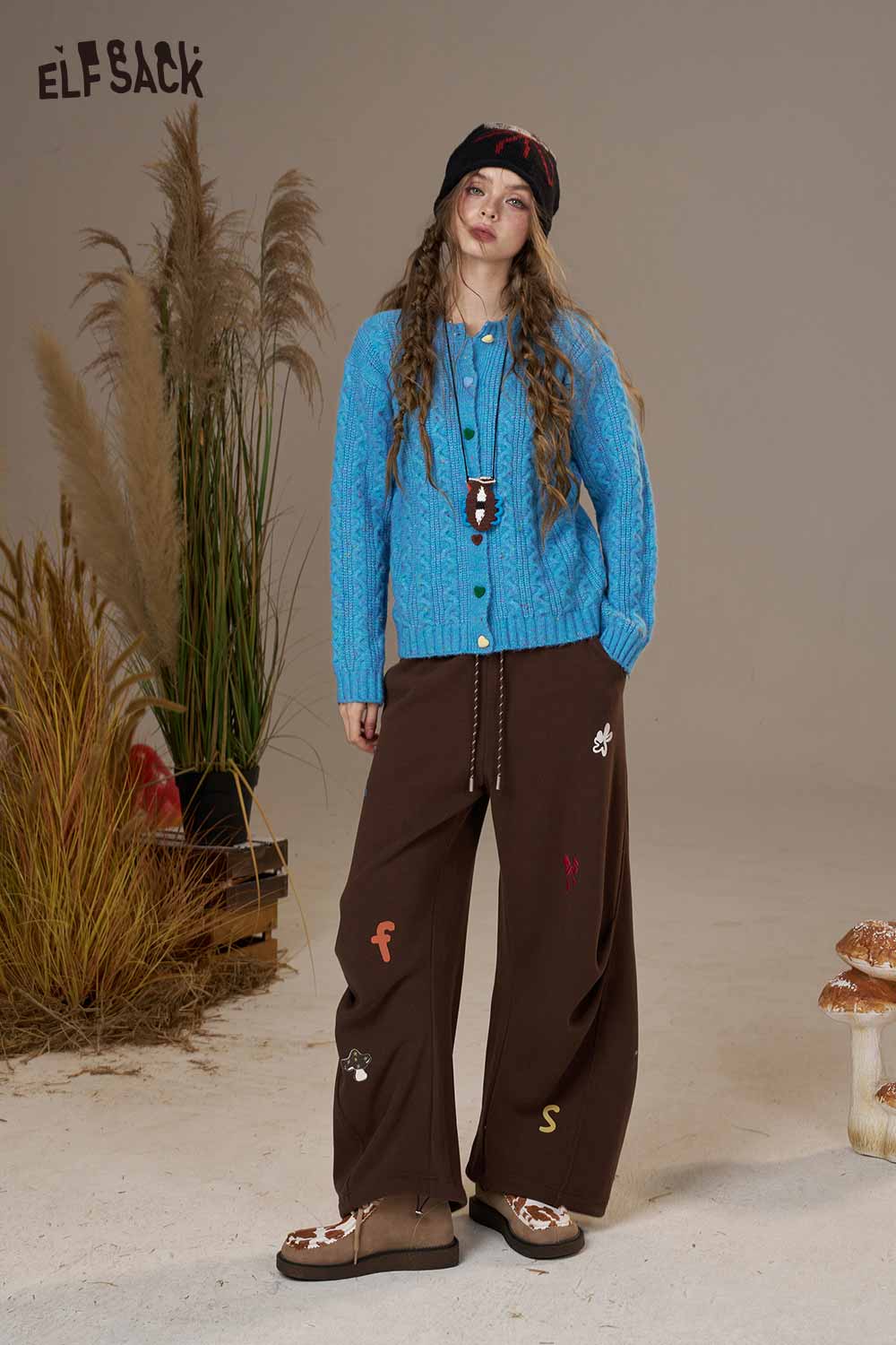 ELFSACK Soft knit cardigan for women in blue, styled with brown wide-leg pants for a cozy look