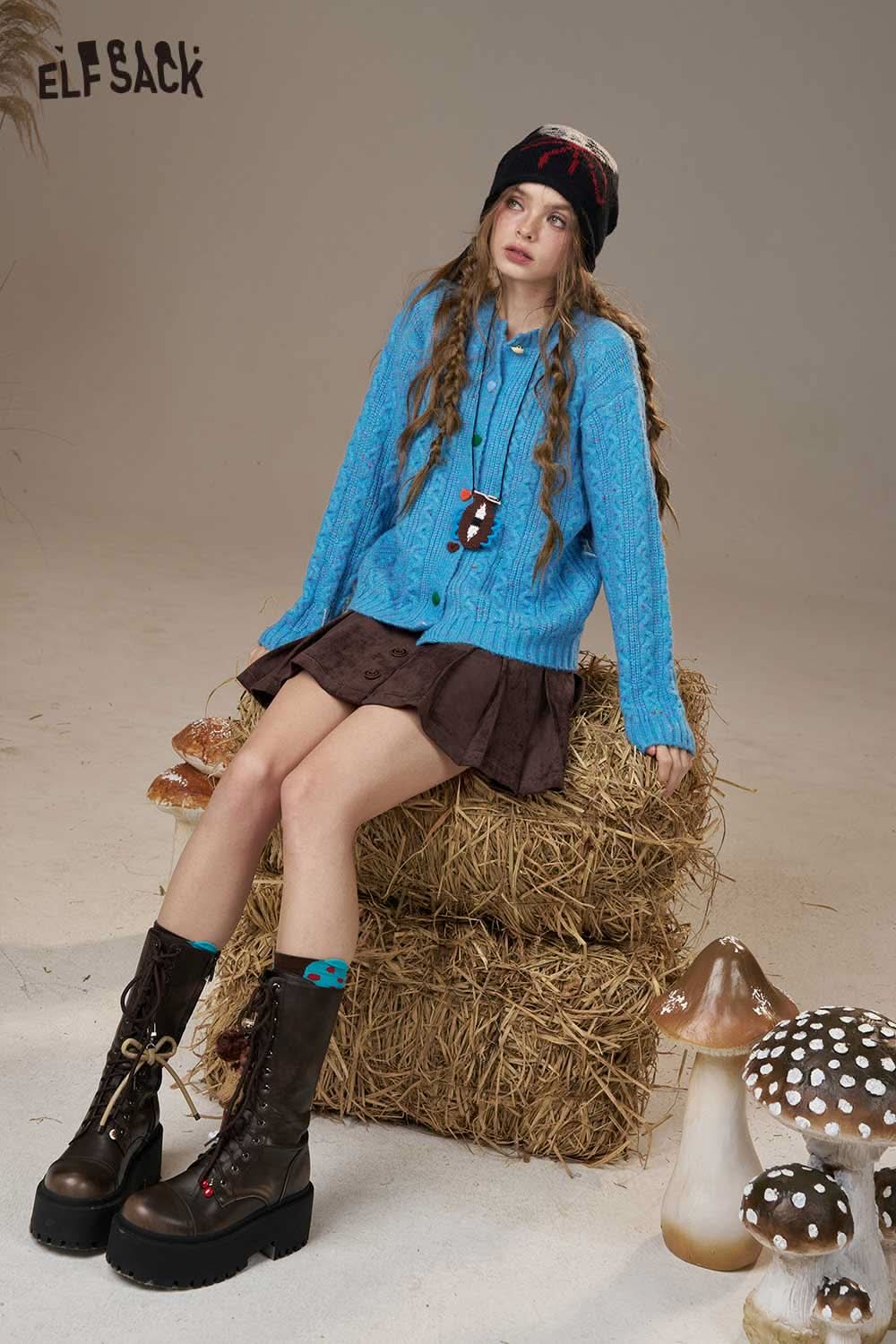 ELFSACK blue soft knit cardigan for women paired with a brown skirt and stylish boots