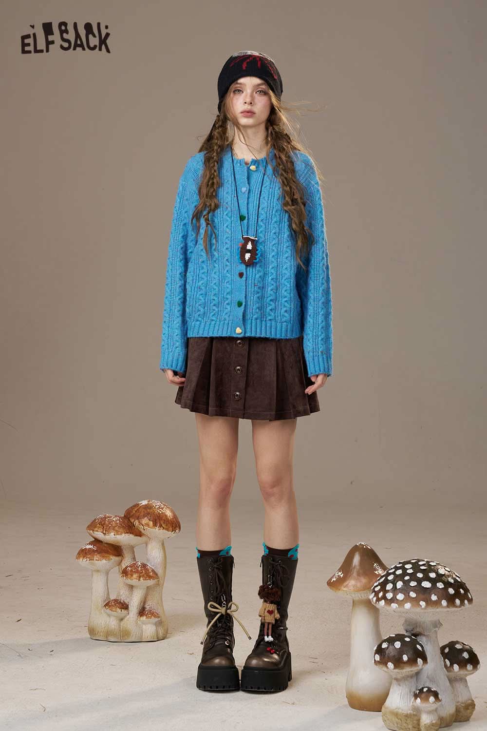 ELFSACK soft knit cardigan for women in blue paired with a brown skirt and stylish boots