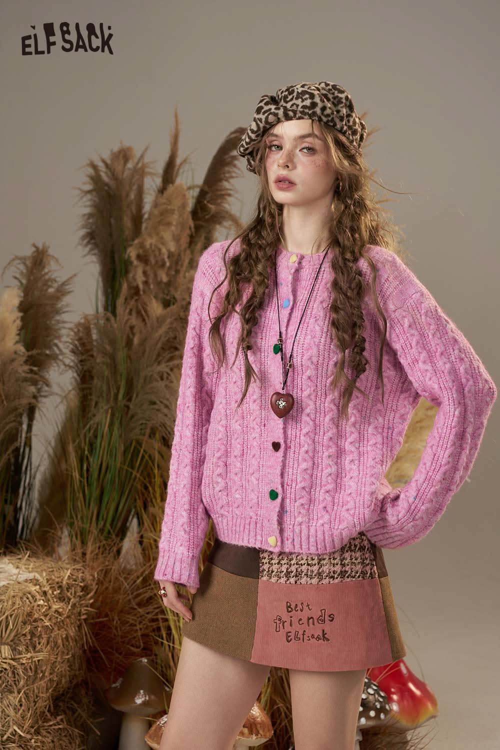 ELFSACK soft knit cardigan for women in vibrant pink with cable knit design and relaxed fit