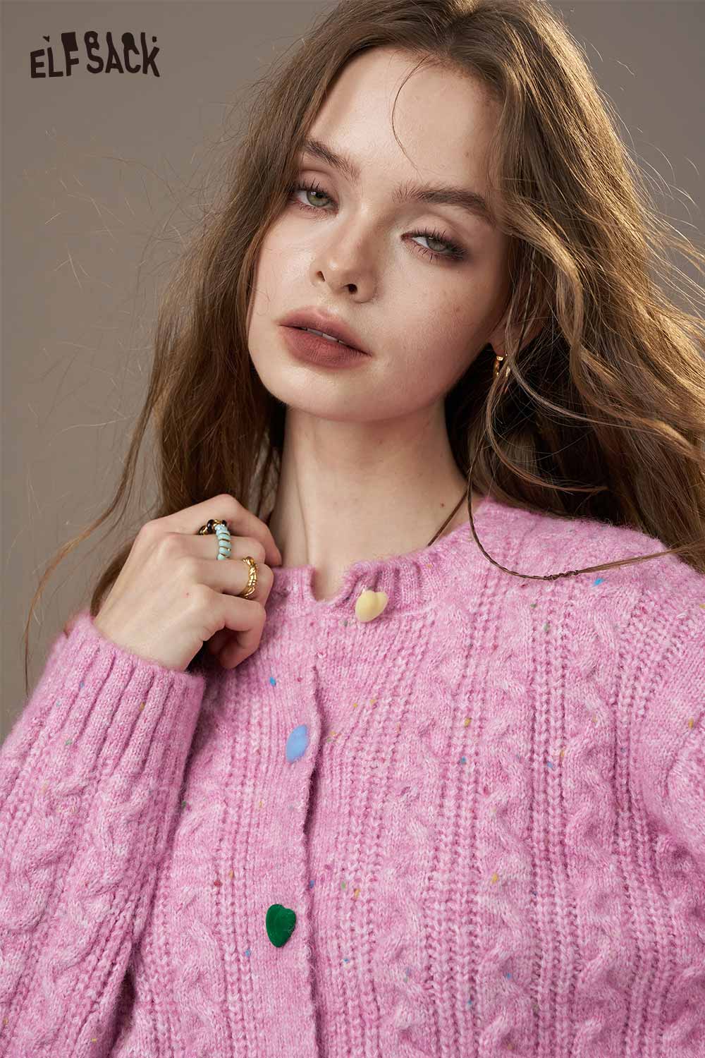 ELFSACK soft knit cardigan for women in pink with playful button details and cable knit design