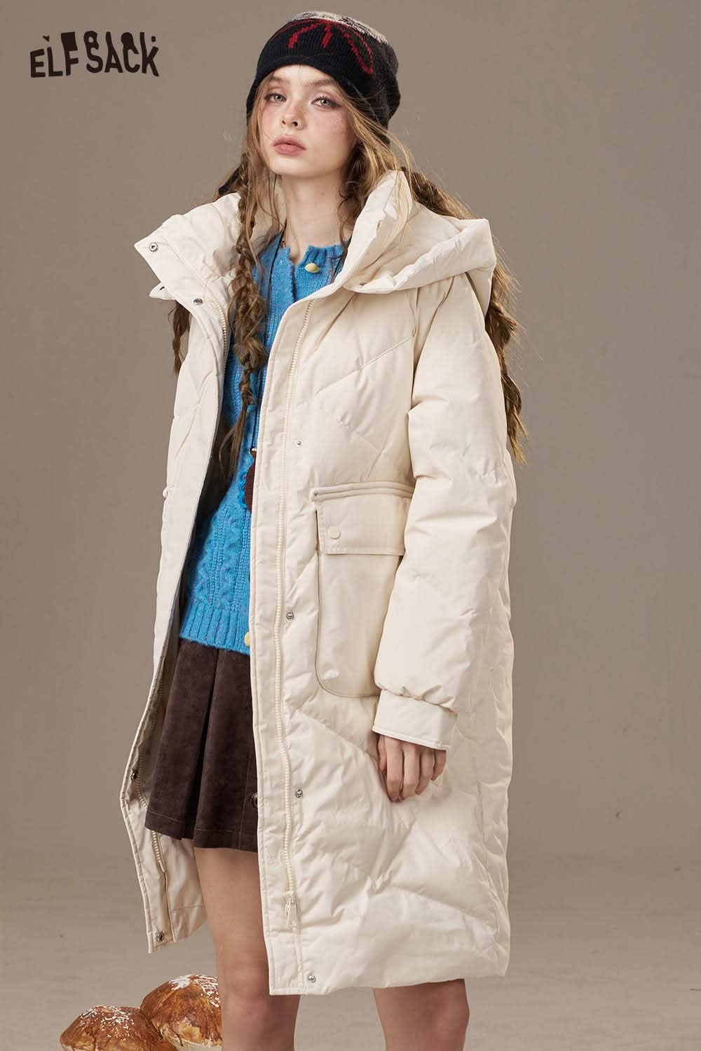 Trendy ELFSACK soft knit cardigan for women layered under a stylish white puffer coat