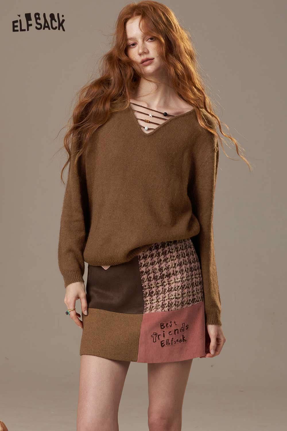 ELFSACK soft knit lace-up sweater in brown with a deep V-neck and relaxed fit for a cozy look