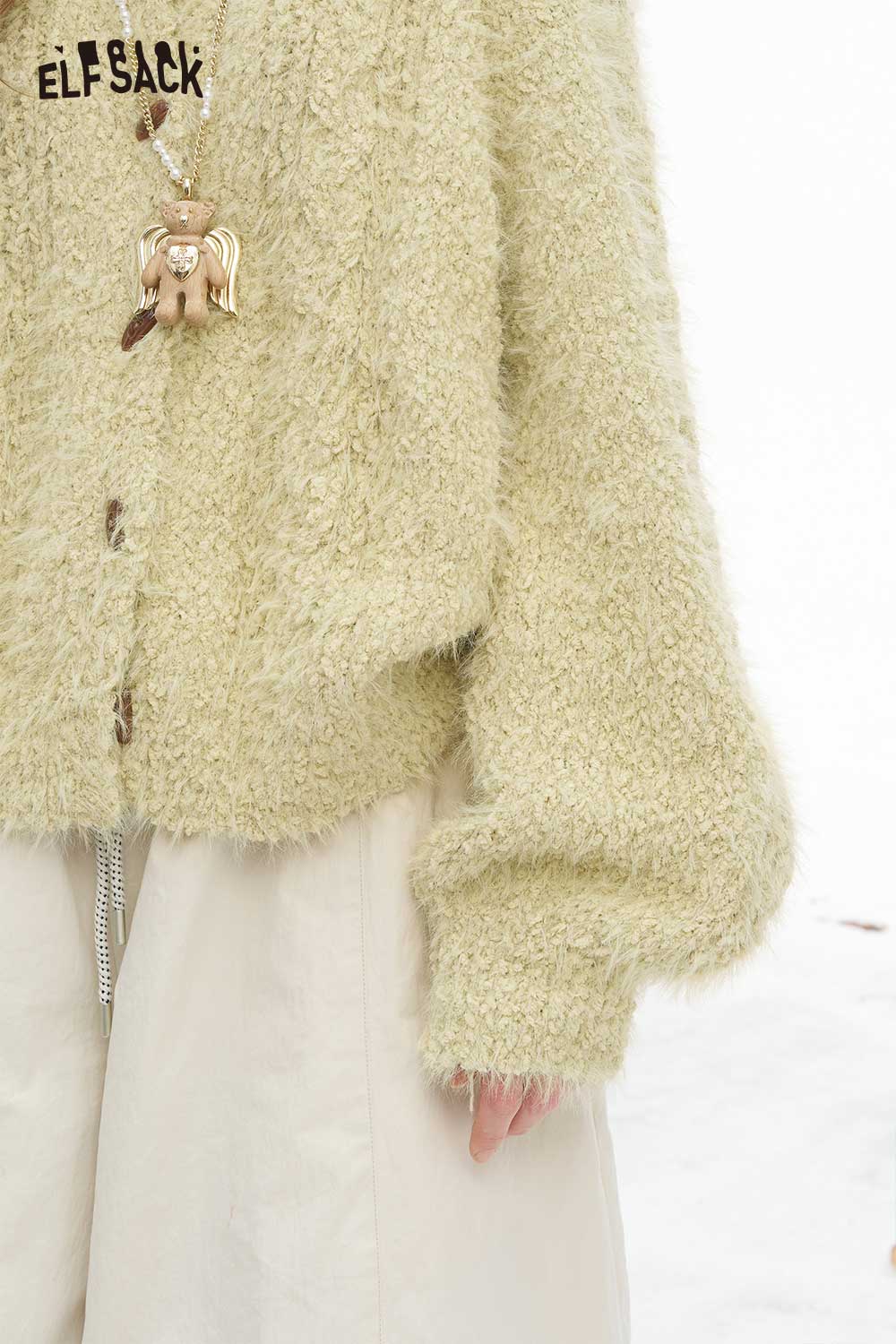 ELFSACK soft plush button sweater in light green with a cozy texture and oversized fit