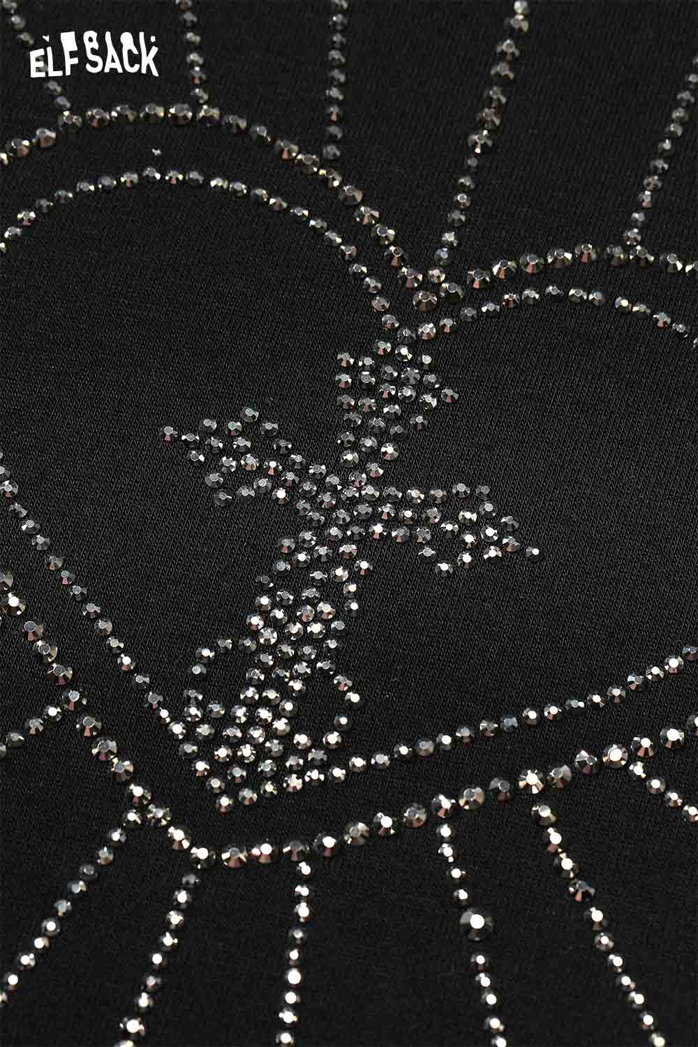 ELFSACK soft slimming high neck tshirt with sparkling heart and cross design on a black background