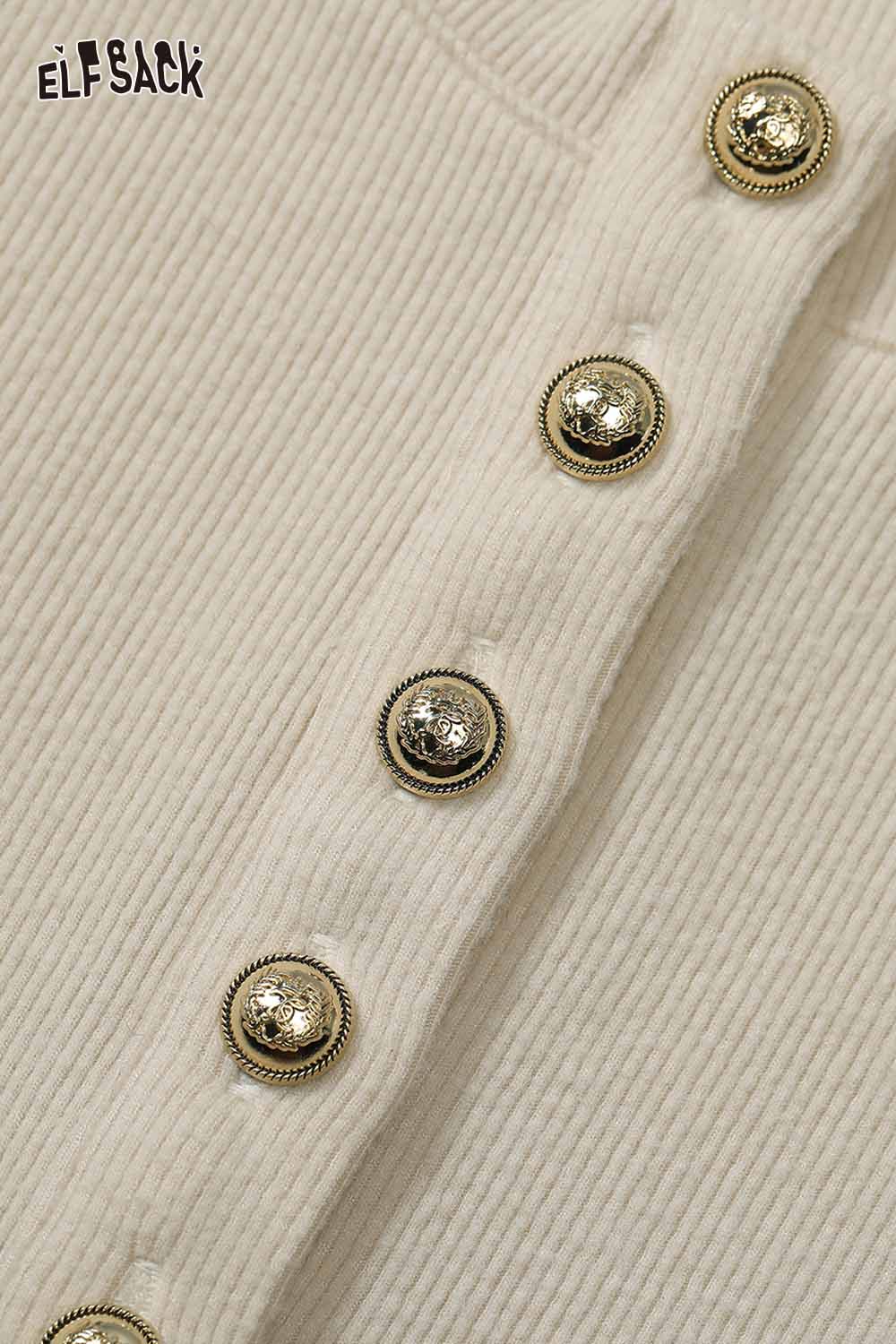 ELFSACK soft spliced sleeve long sleeve tshirt with decorative gold buttons on soft fabric