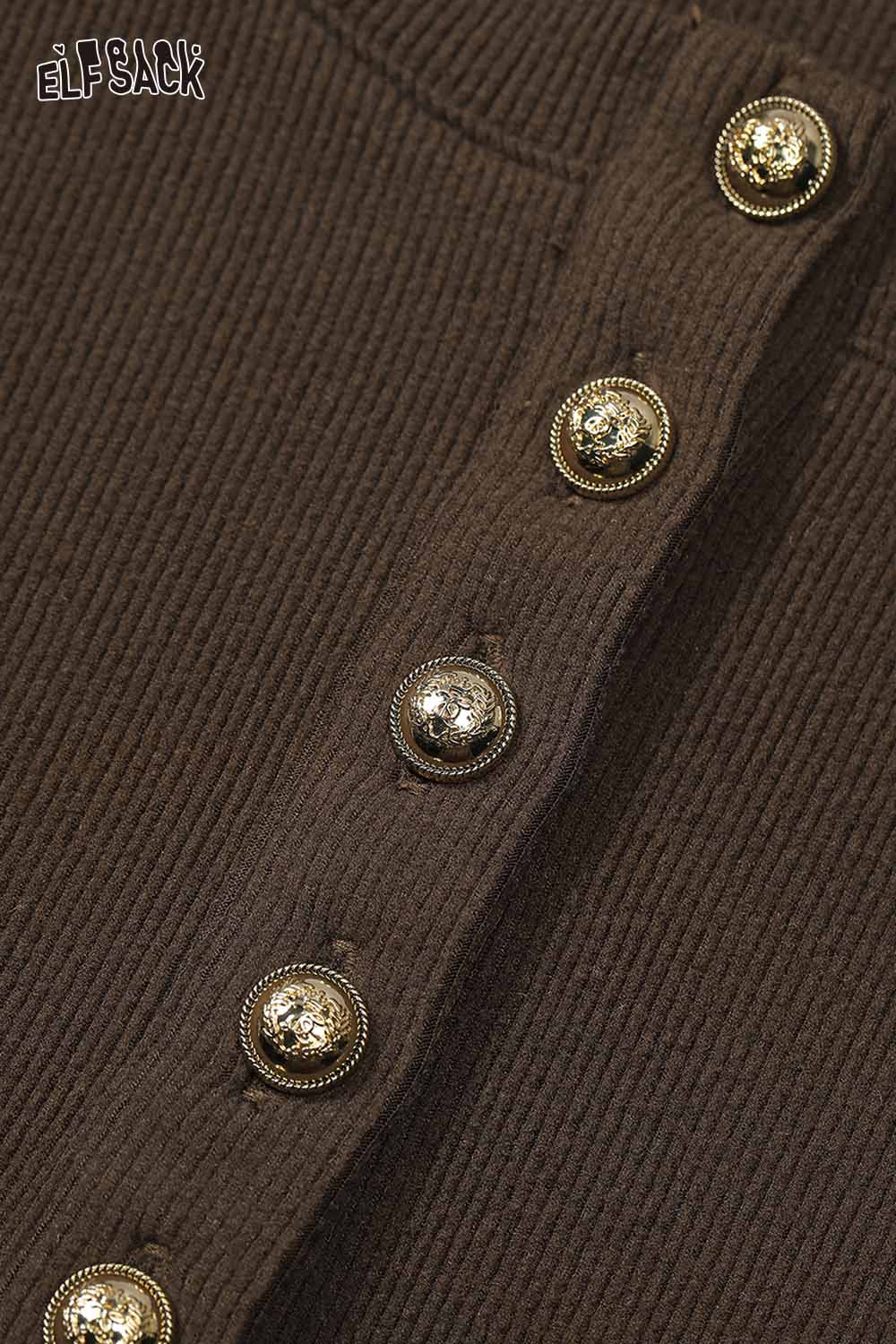 Close-up of ELFSACK soft spliced sleeve long sleeve tshirt featuring stylish button details